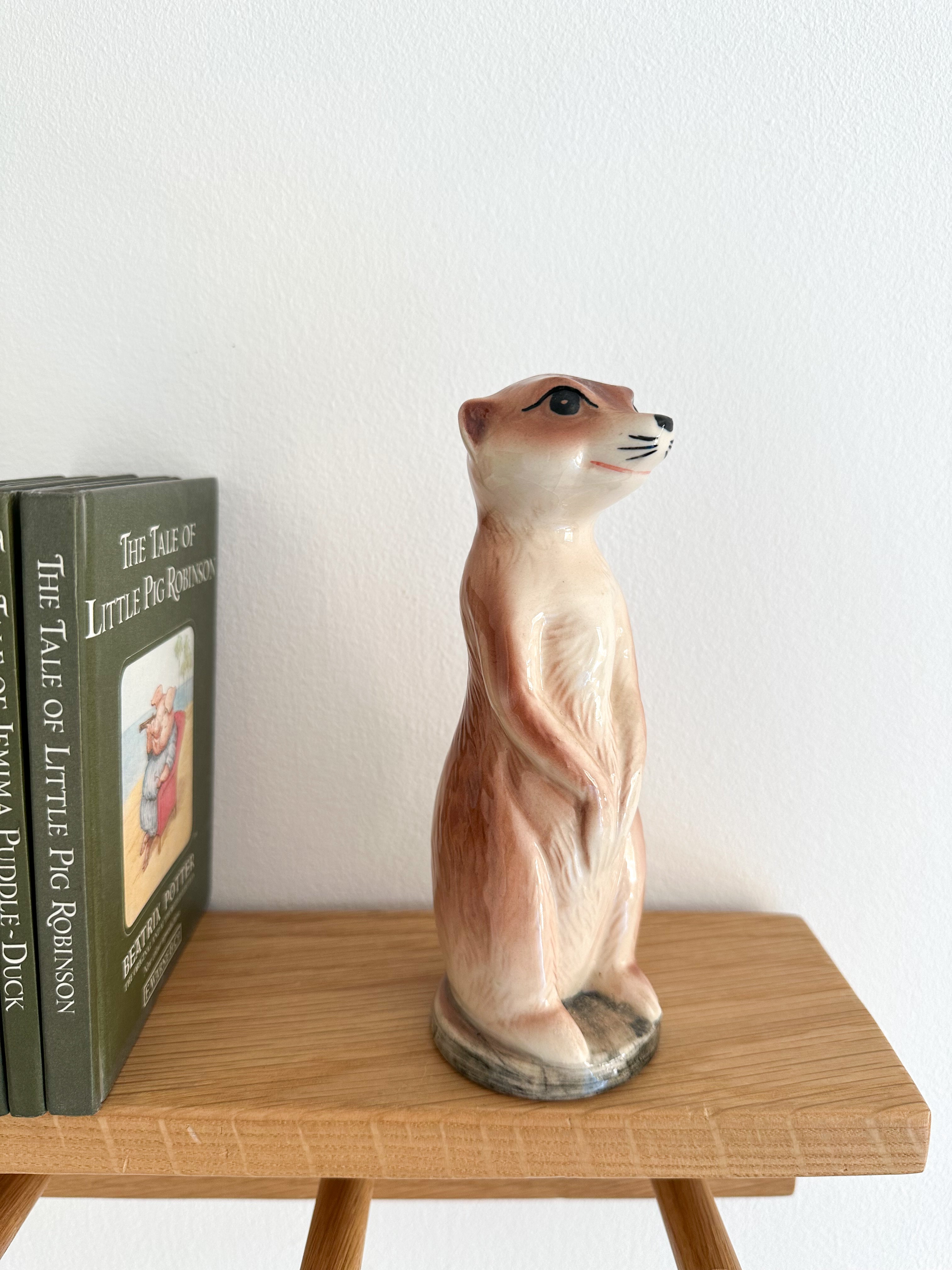 Vintage ceramic meerkat piggy bank or money box - Moppet