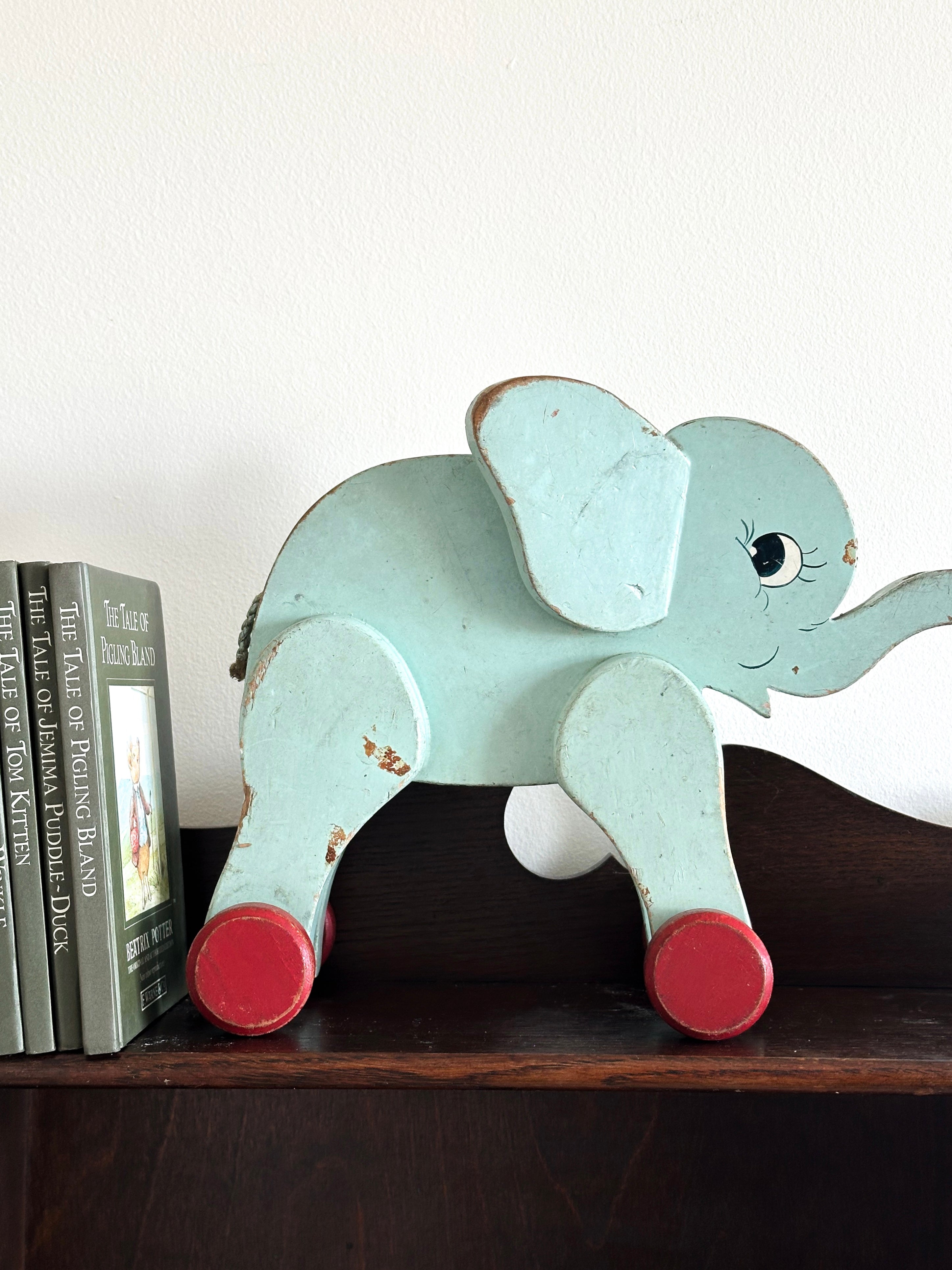 Vintage 1950s wooden pull-along elephant
