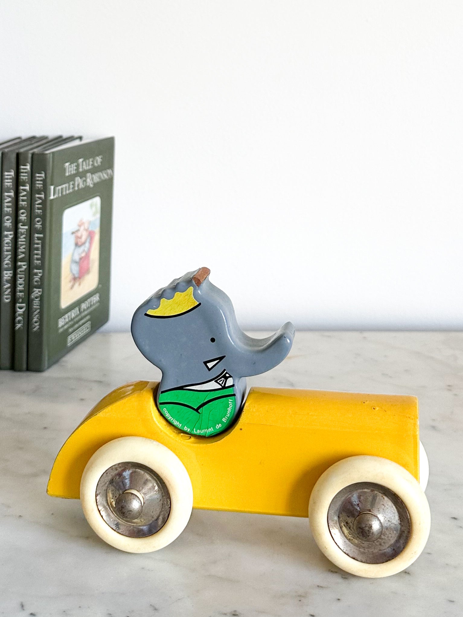 Vintage 1989 wooden Babar in car - Moppet