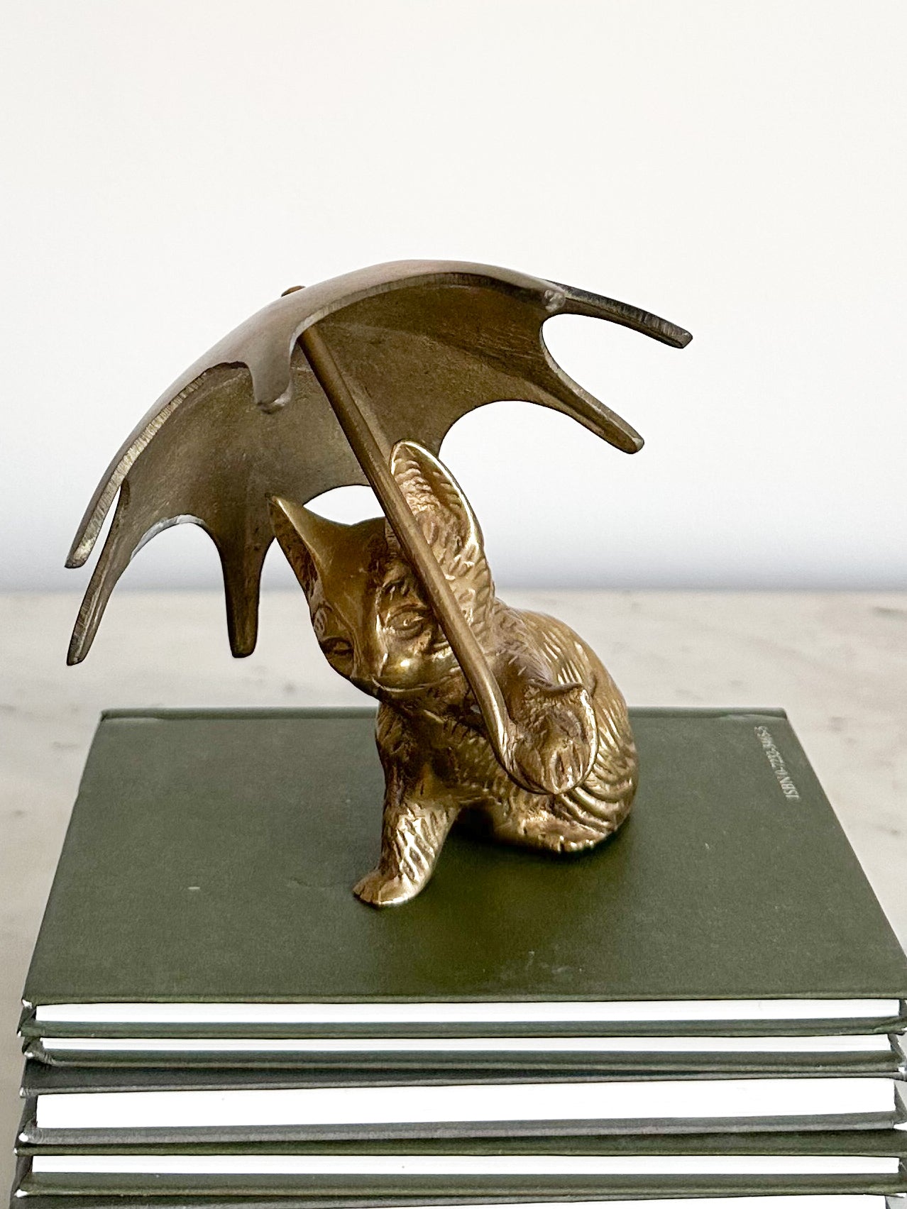 Vintage brass cat/kitten with umbrella