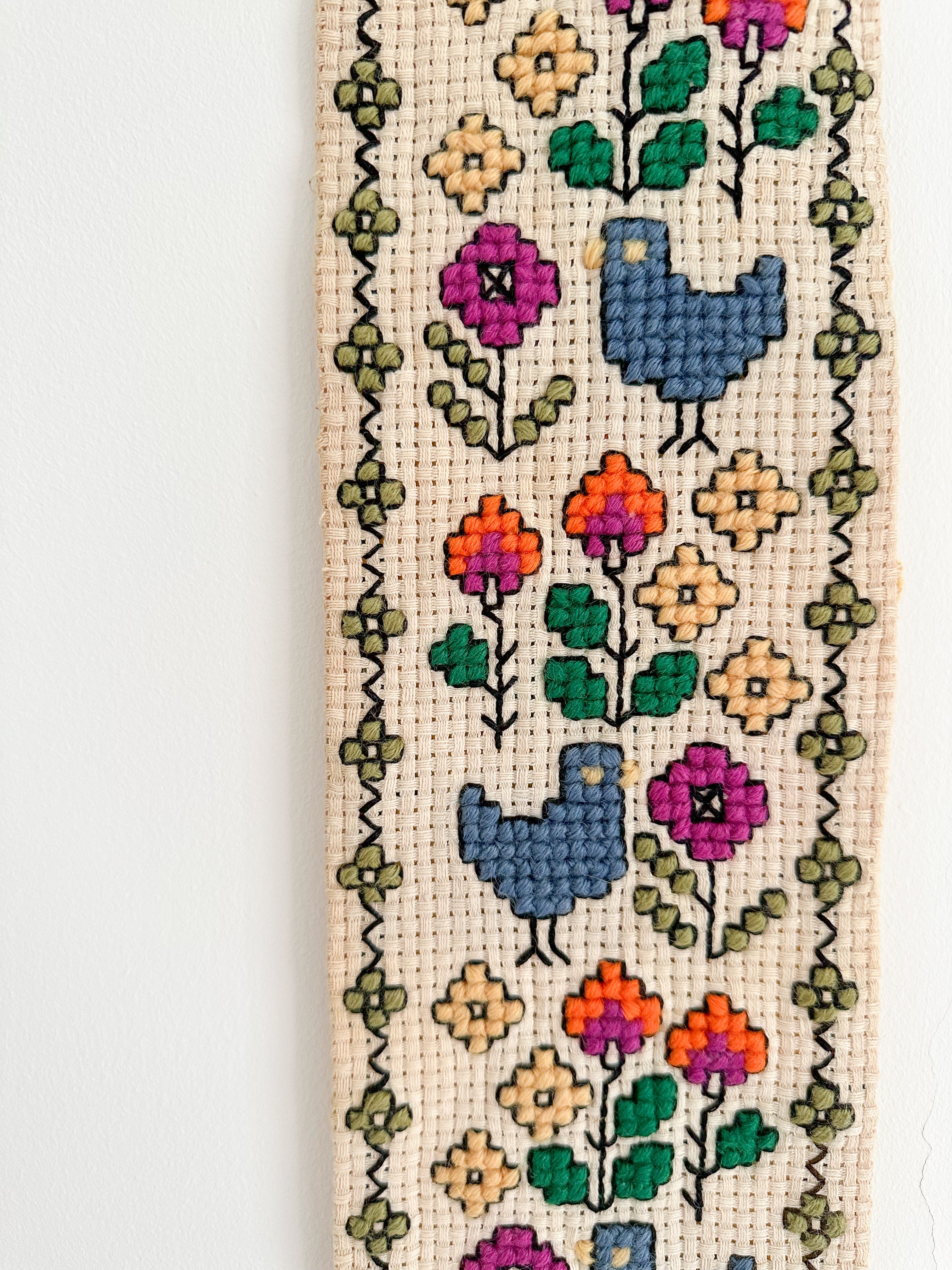 Vintage Scandinavian needlepoint embroidery wall hanging featuring birds and flowers, blue, yellow, purple and orange - Moppet