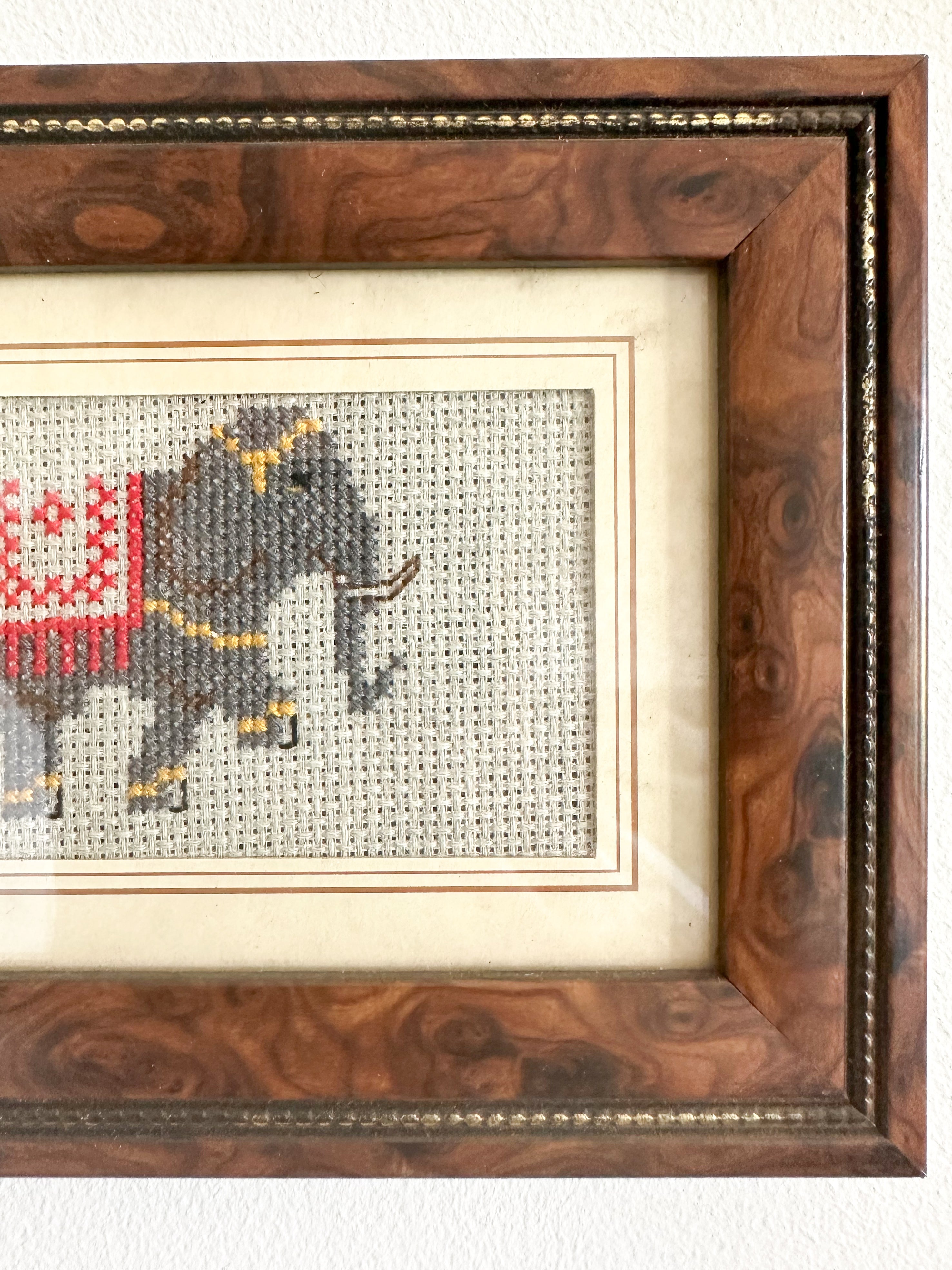 Vintage cross stitch sampler featuring an elephant - Moppet