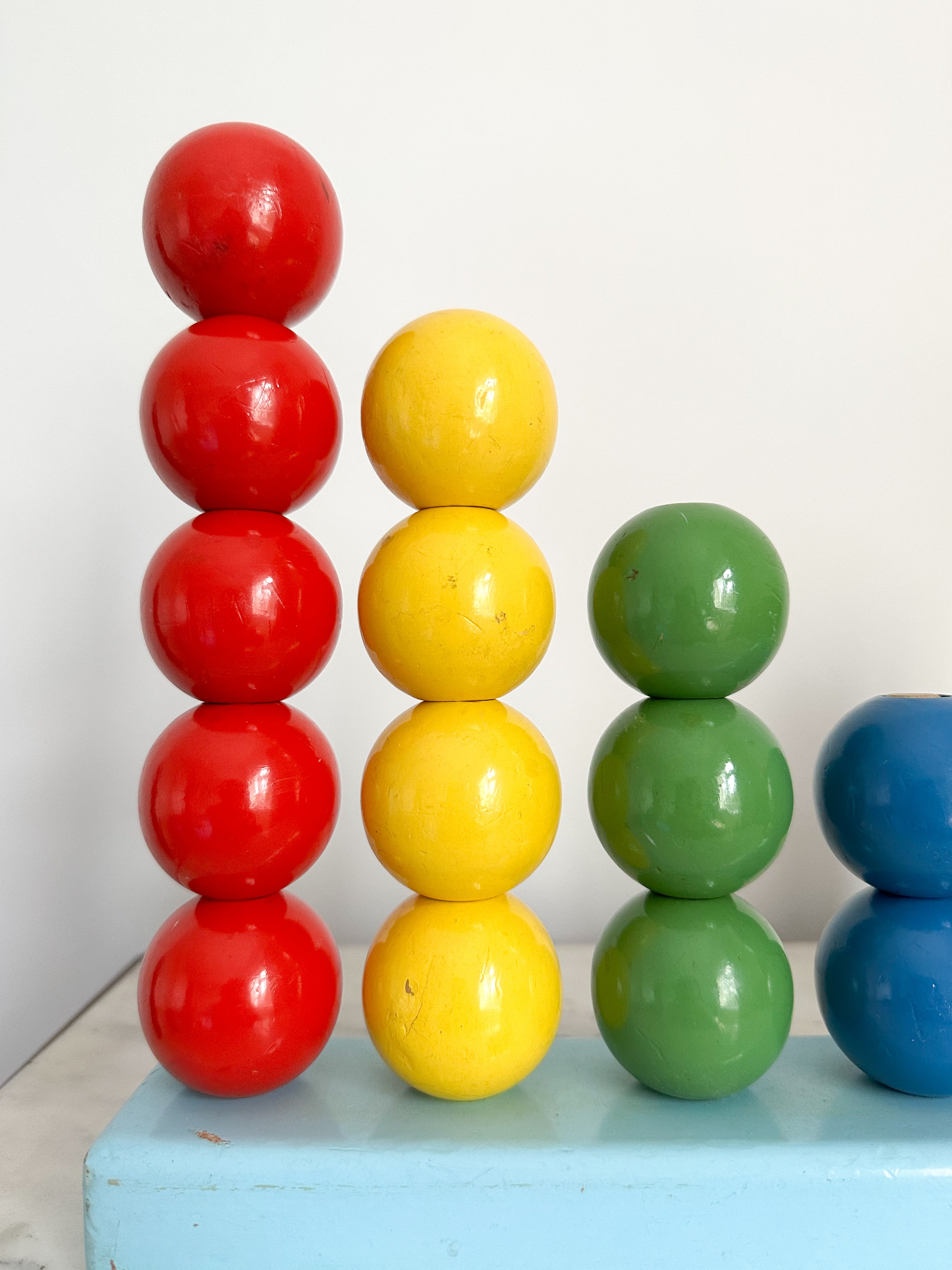 Vintage 1950s Escor stacking counting toy in primary colours, British made - Moppet