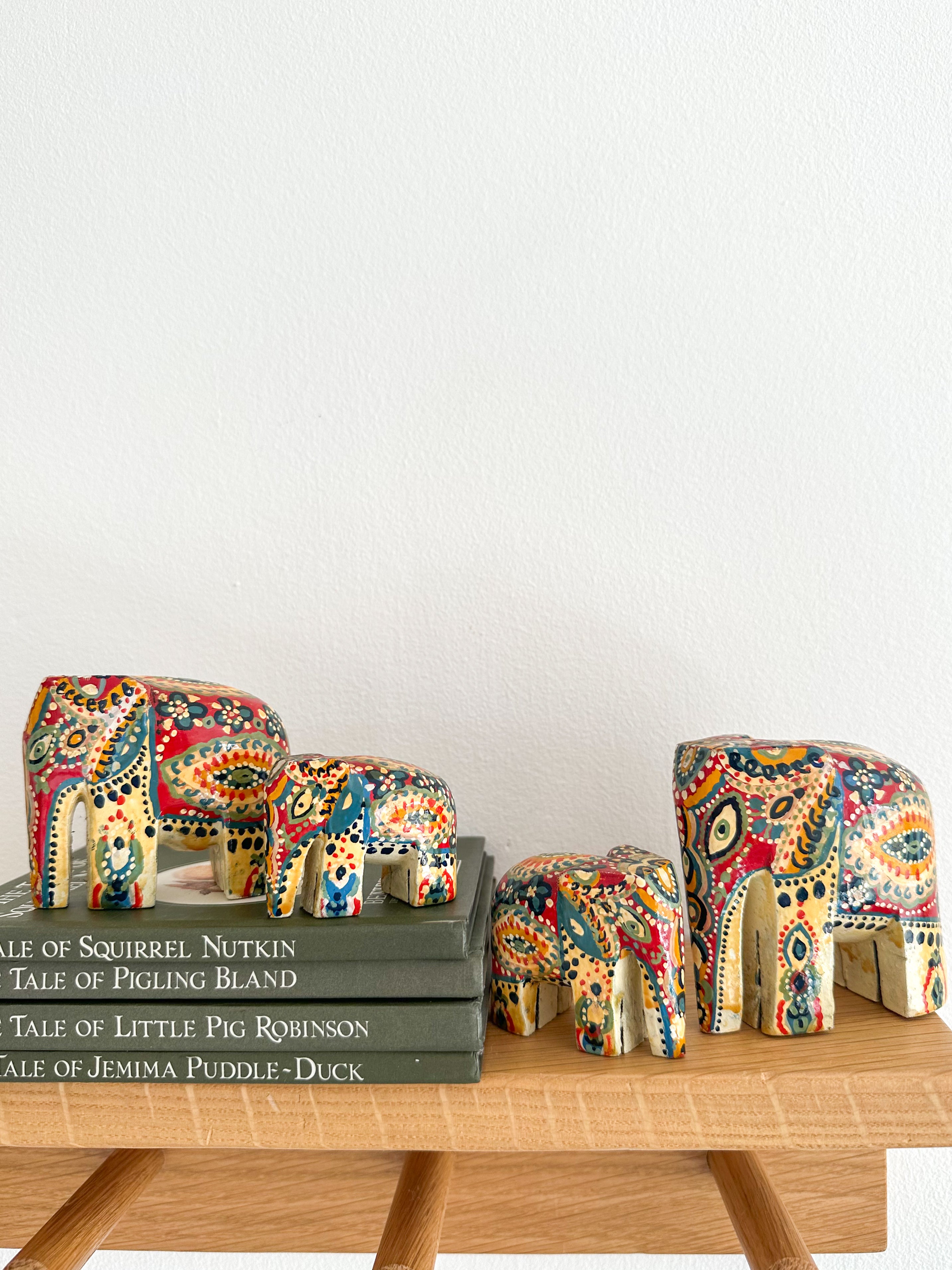 Vintage 1950s hand-painted folk-art wooden elephant family of four - Moppet