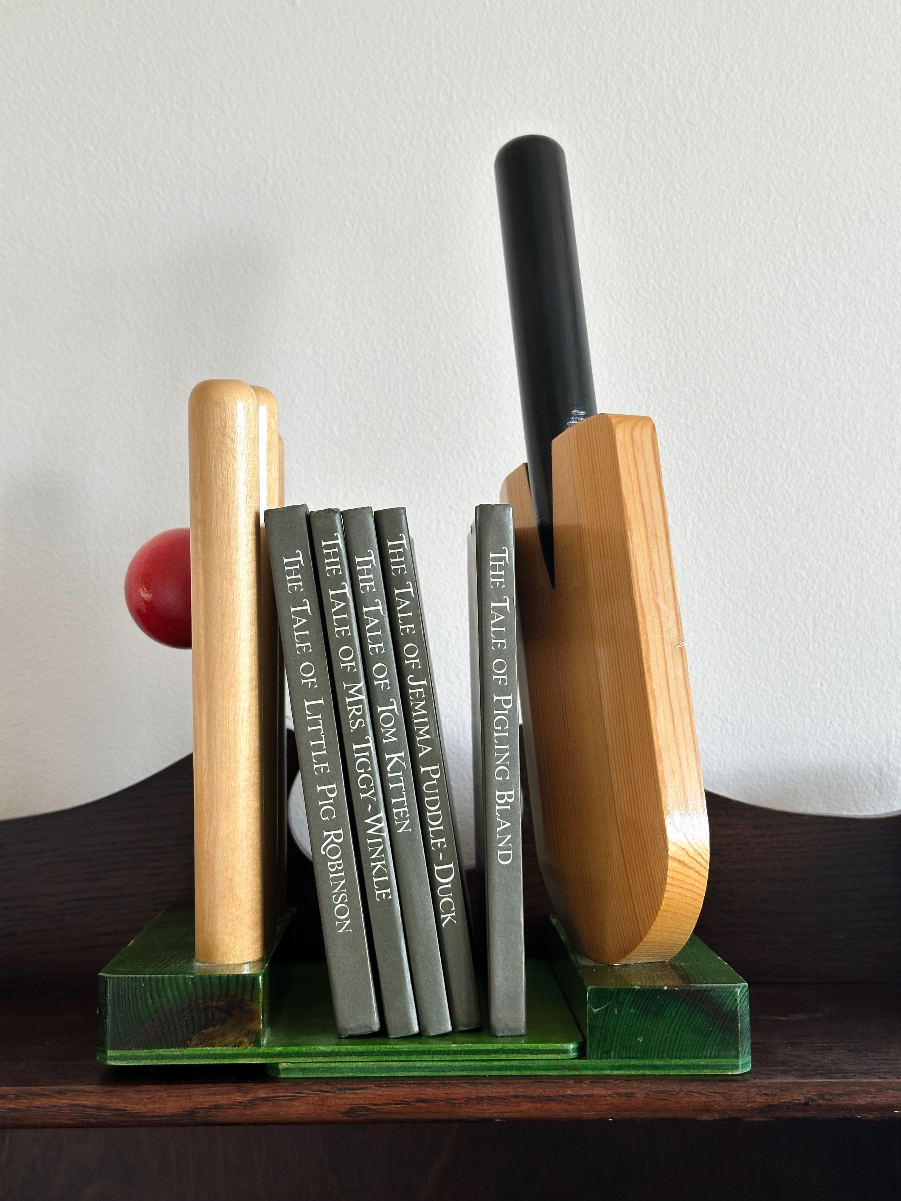 Pair of vintage handmade wooden cricket bat/wicket bookends