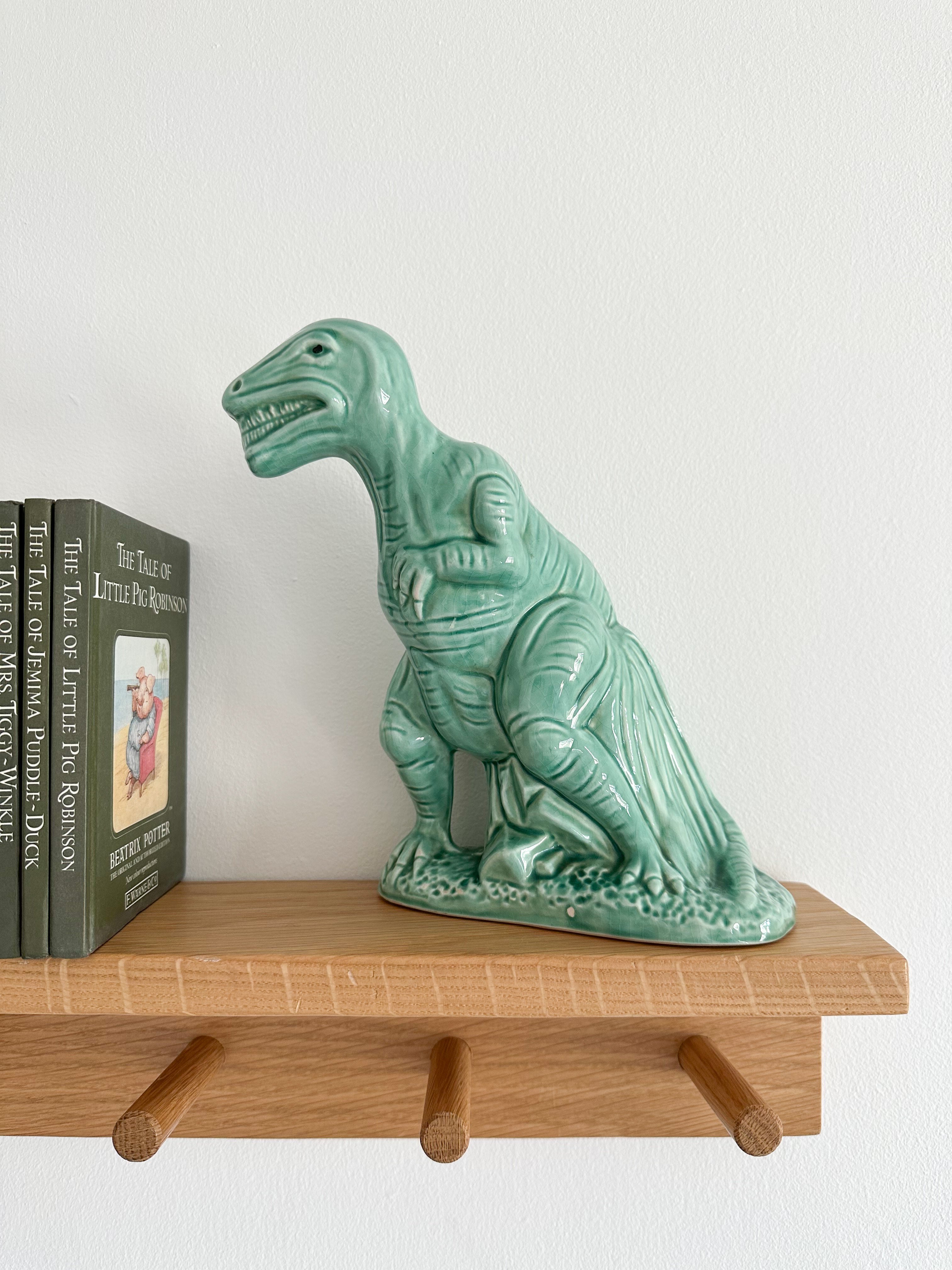Vintage ceramic T-Rex/tyrannosaurus dinosaur piggy bank or money box, in turquoise green, by R Moss - Moppet
