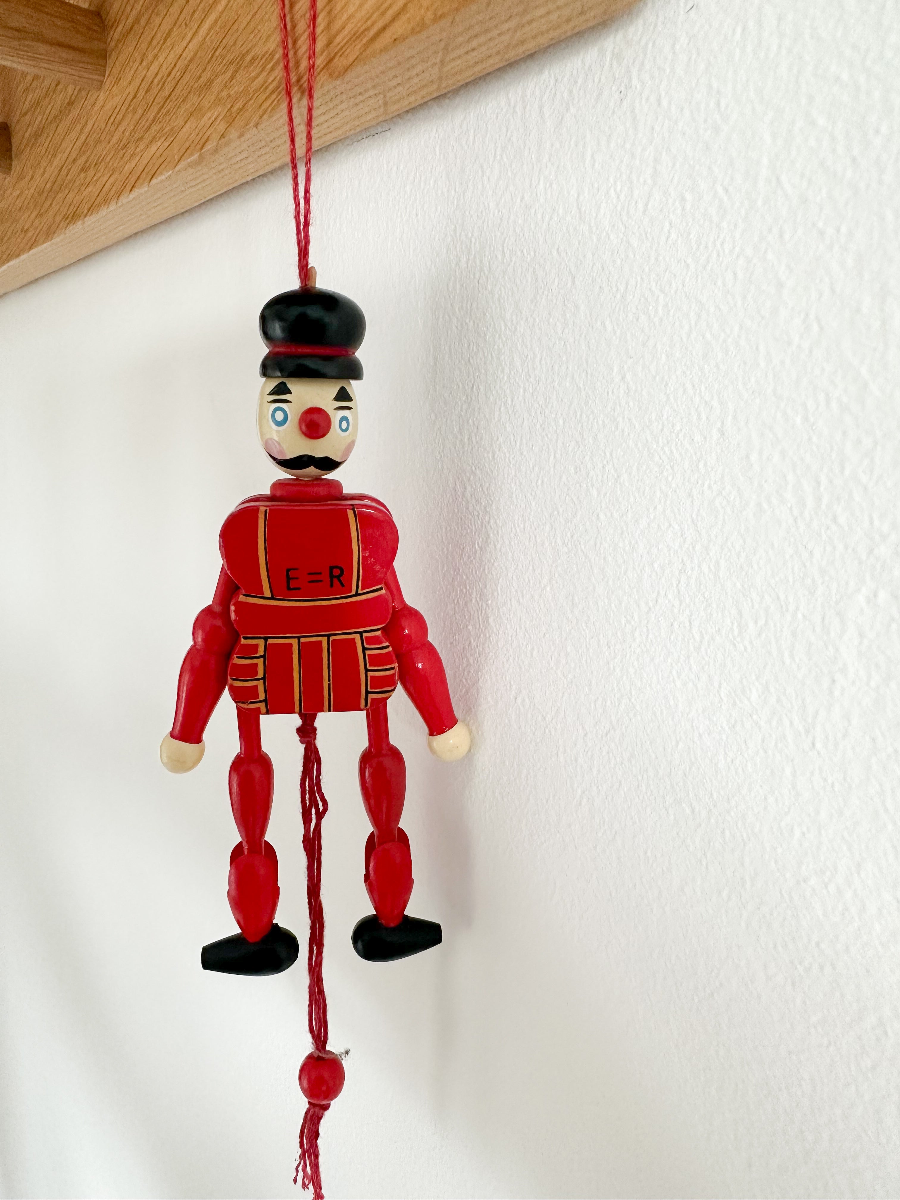 Vintage British Guardsman soldier jumping-jack pull toy - Moppet