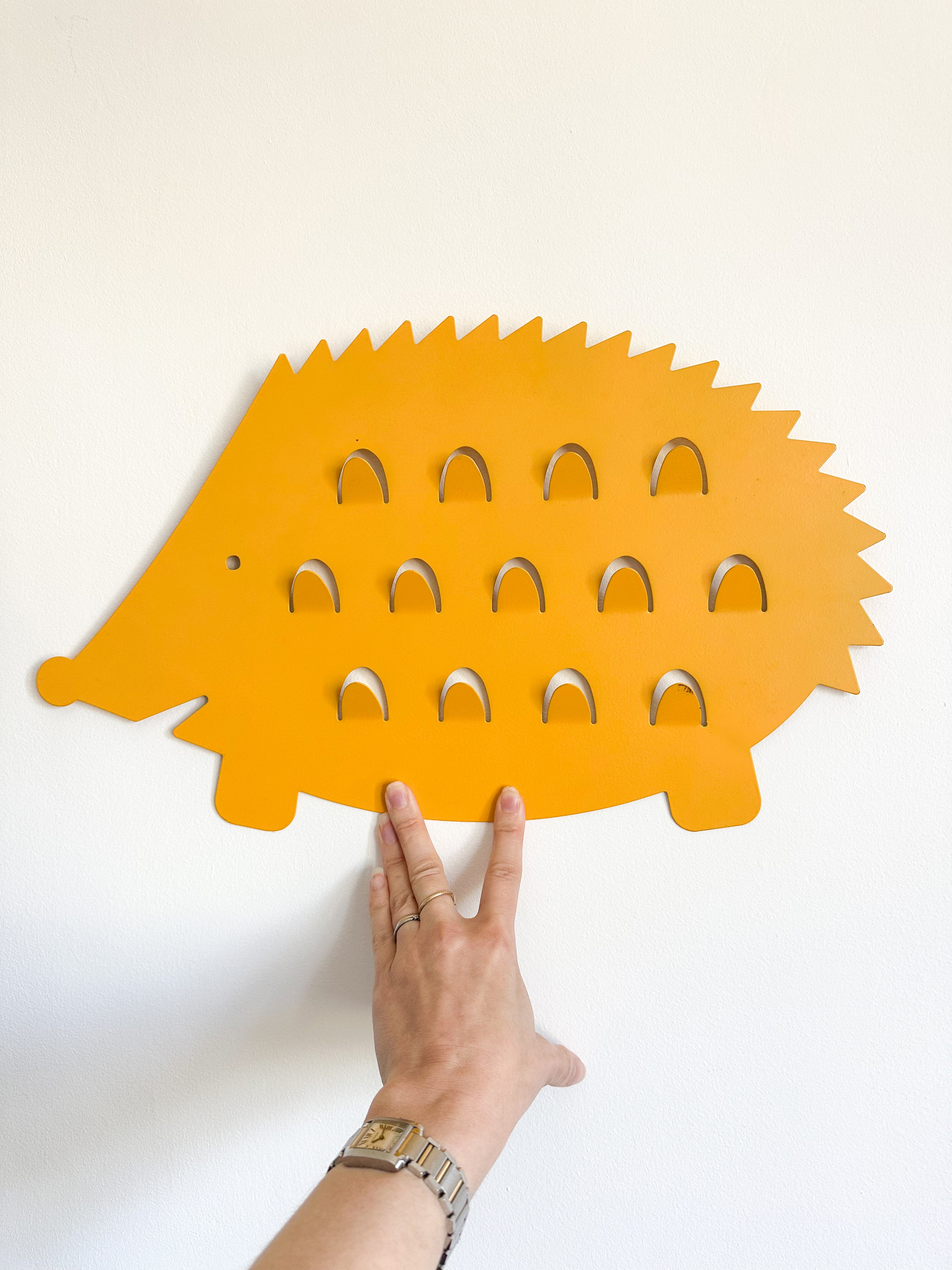 Vintage Hedgehog peg rail coat hook rack