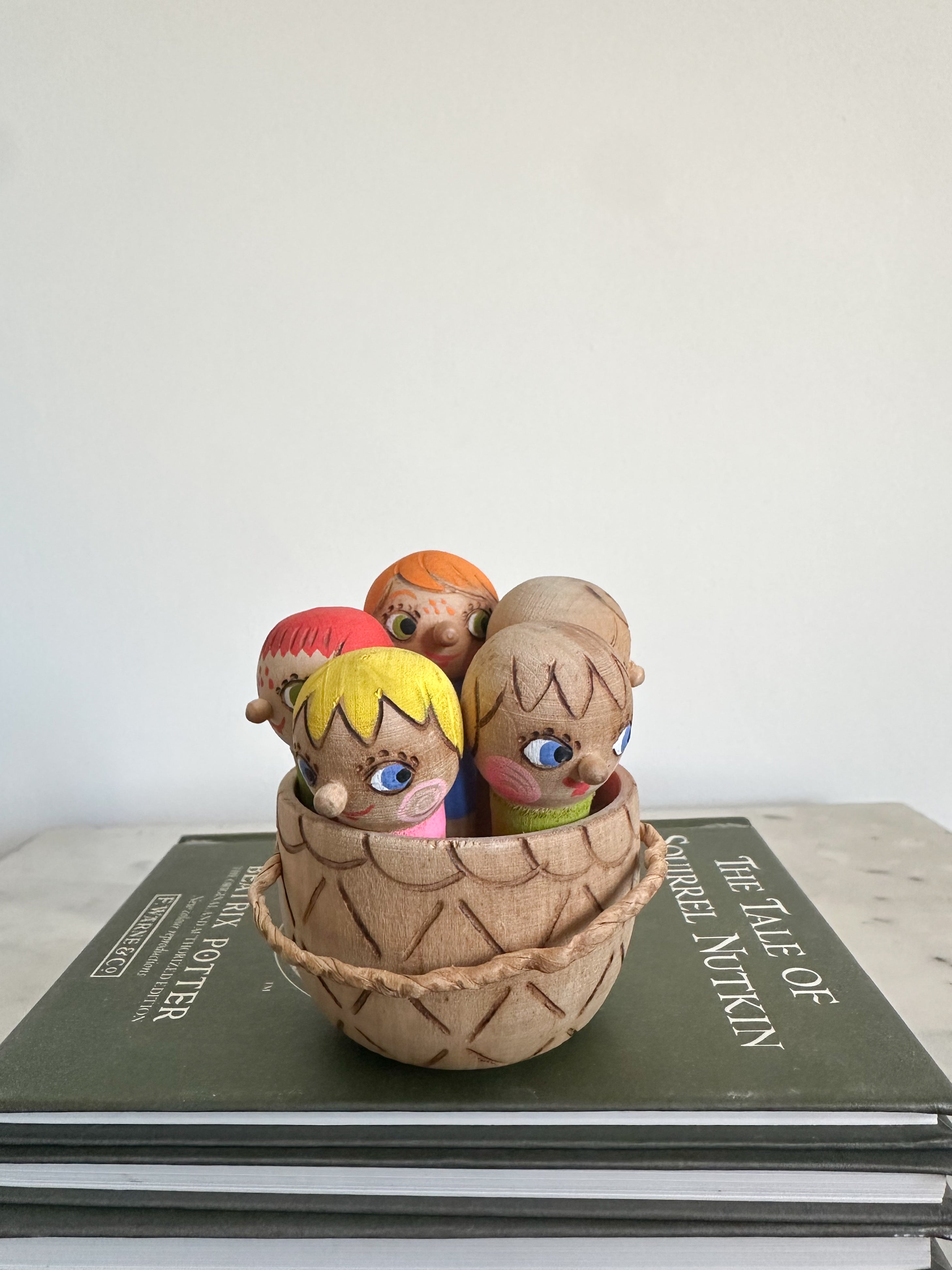 Vintage Russian wooden basket of dolls