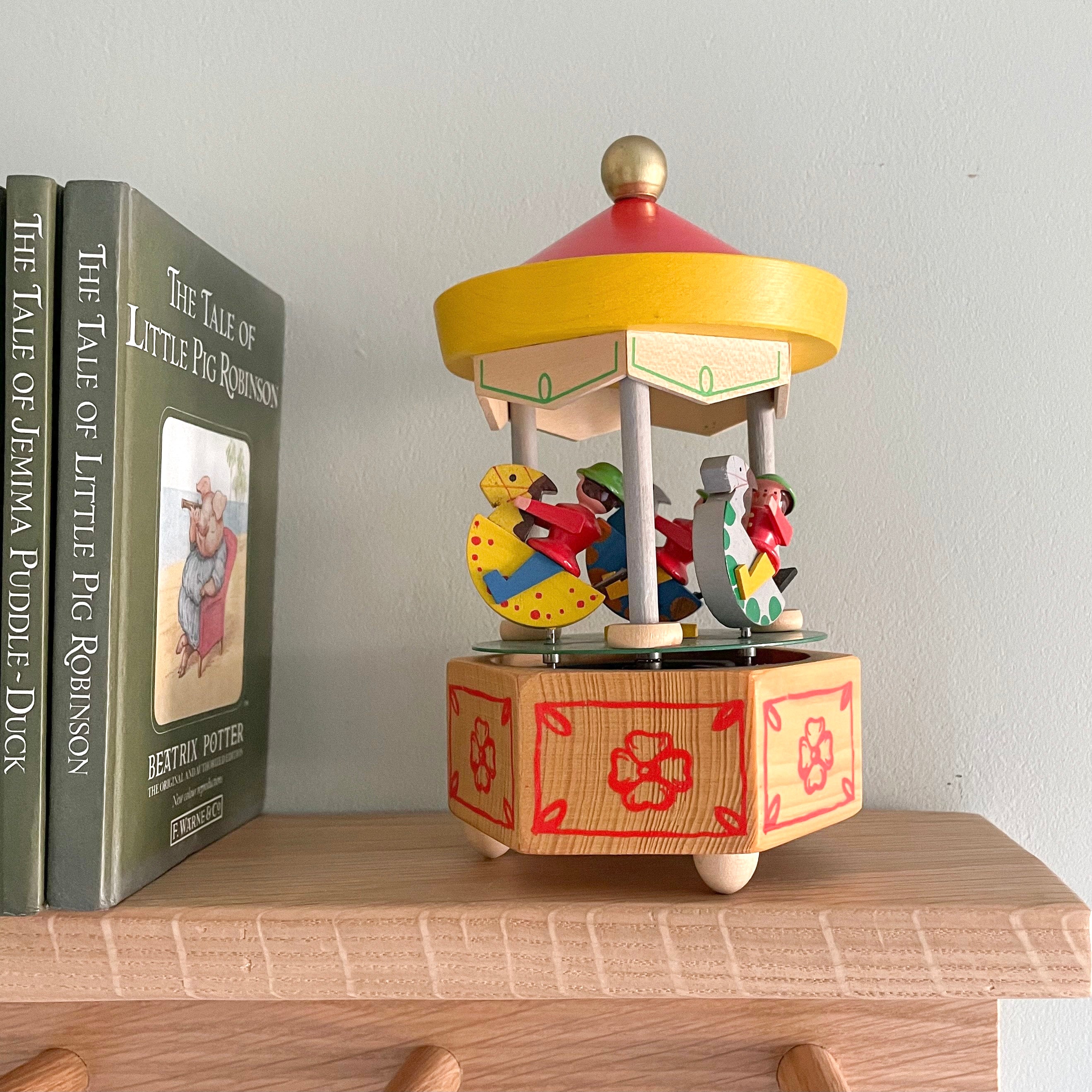 Vintage wooden German Erzgebirge carousel merry go round music box, by Christian Ulbricht - Moppet
