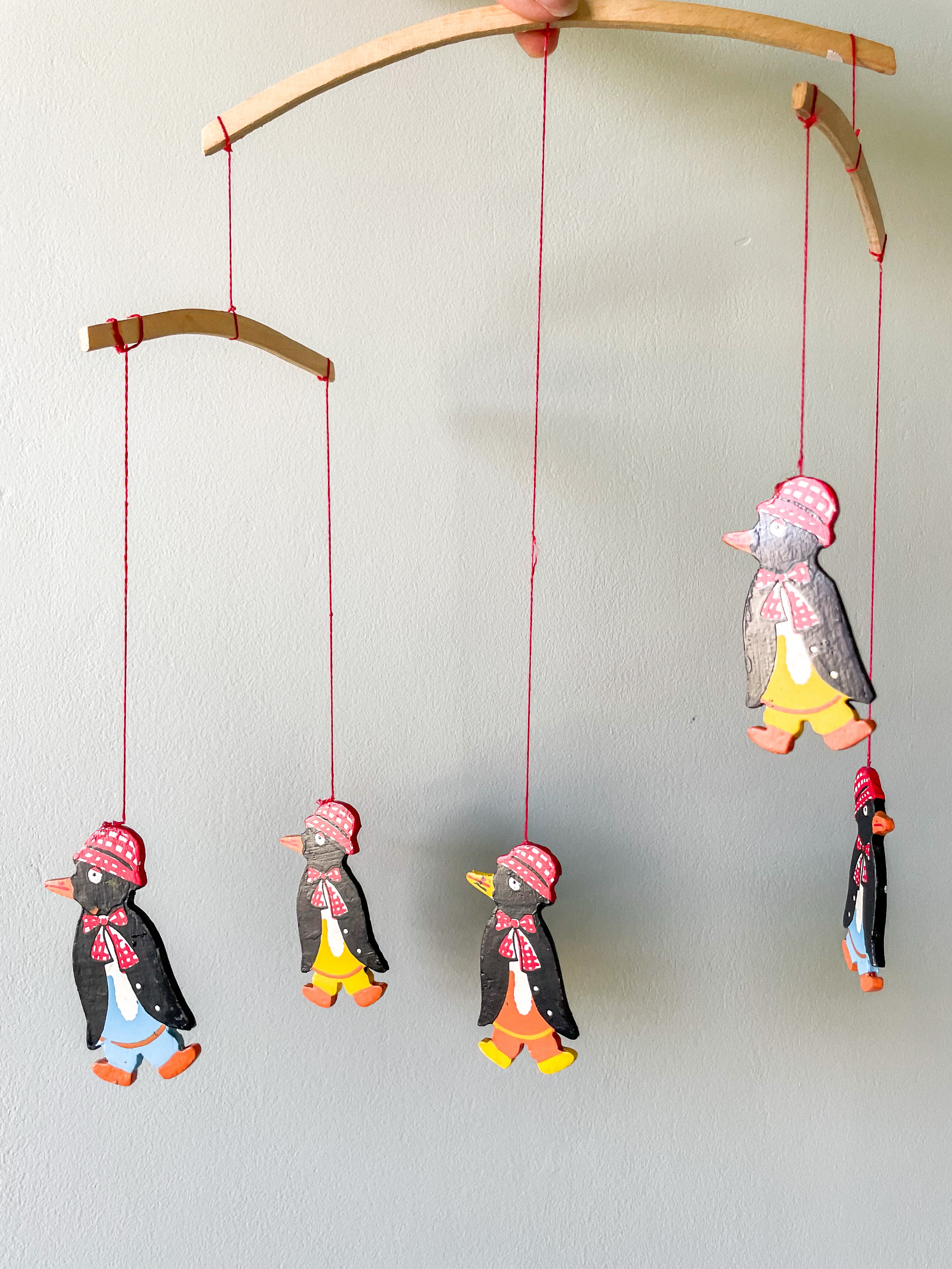Vintage wooden mobile featuring penguins - Moppet