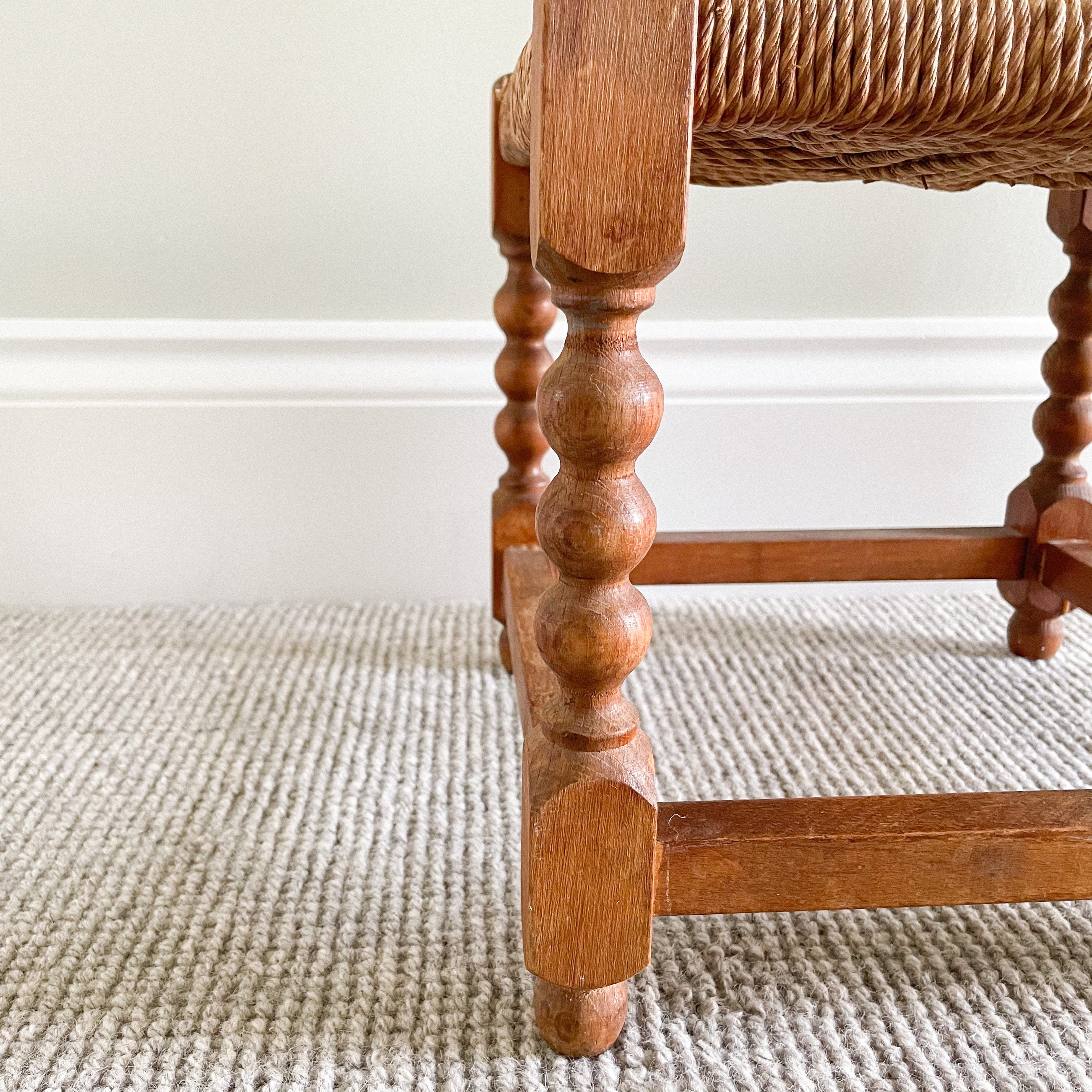 Vintage bobbin legged wooden stool with woven seat - Moppet