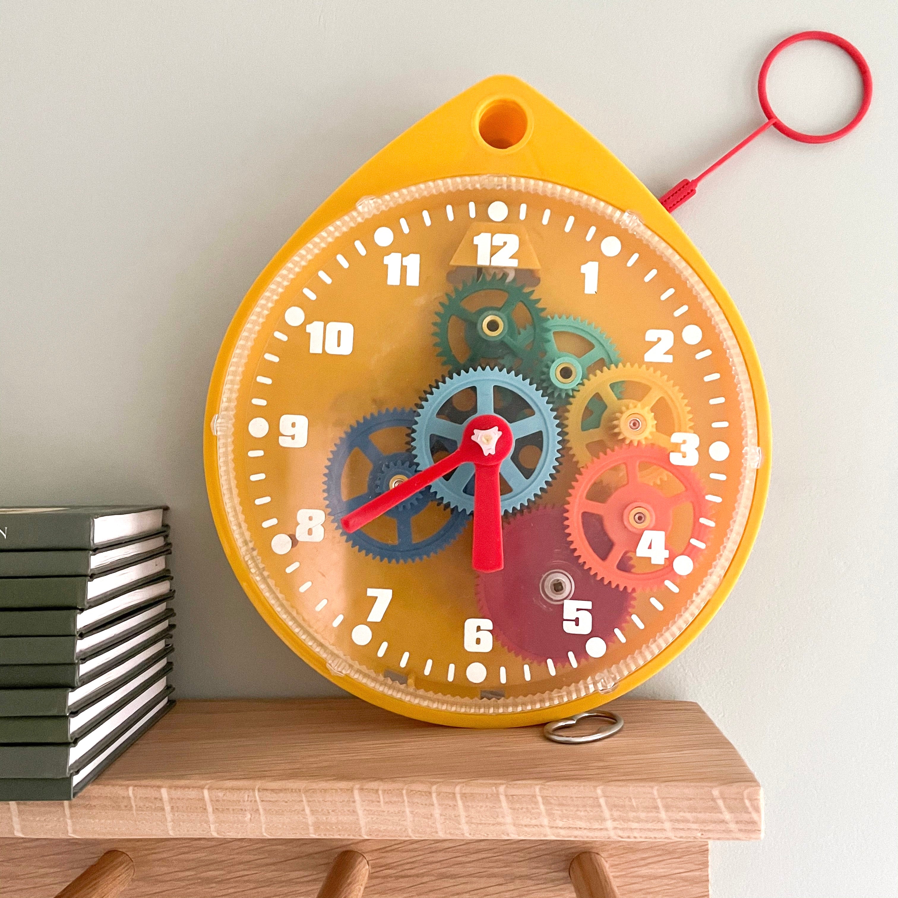 Vintage 1950s mechanical educational toy clock (yellow) - Moppet