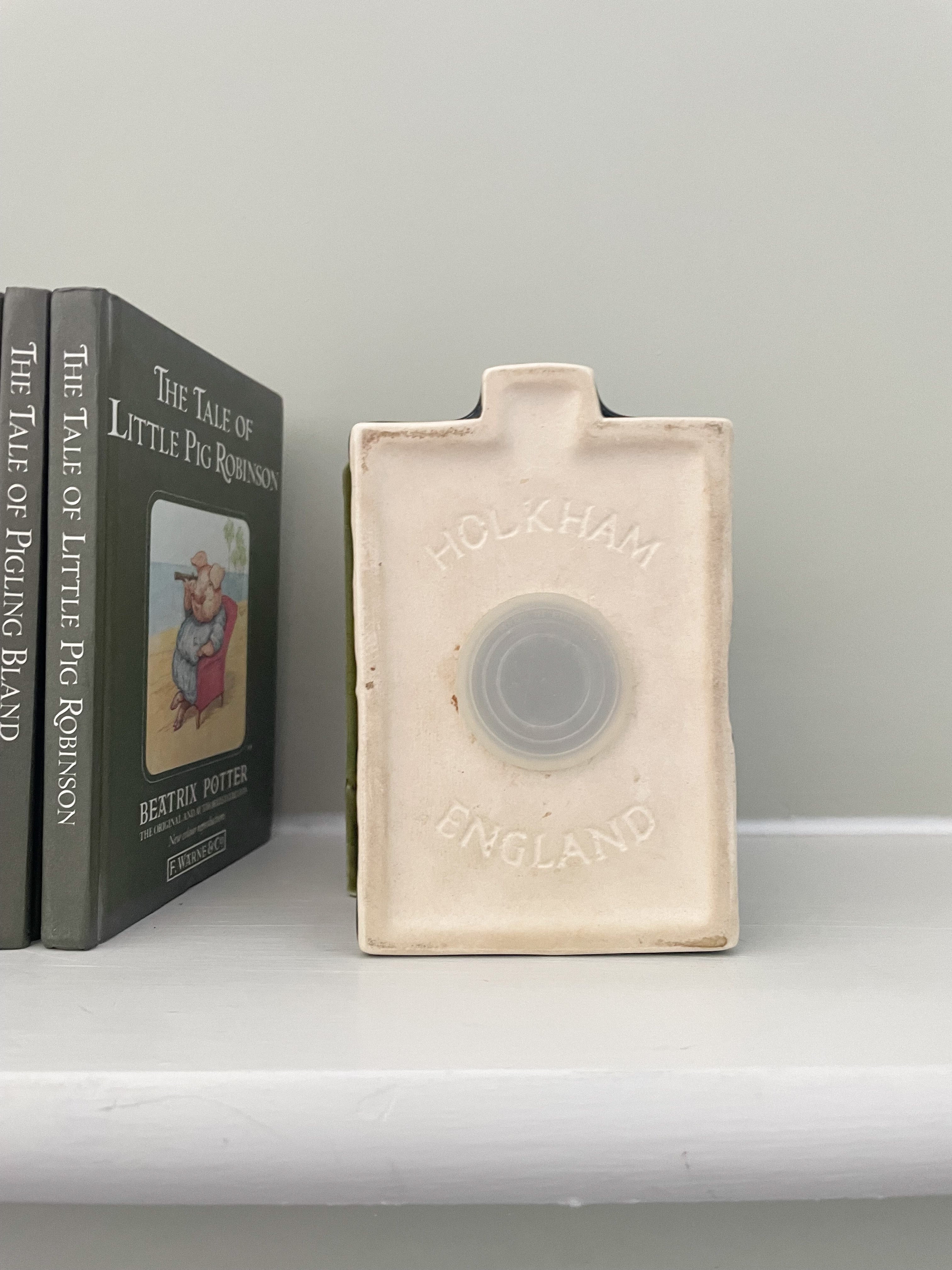 Vintage ceramic house money box in olive green, by Holkham Pottery - Moppet