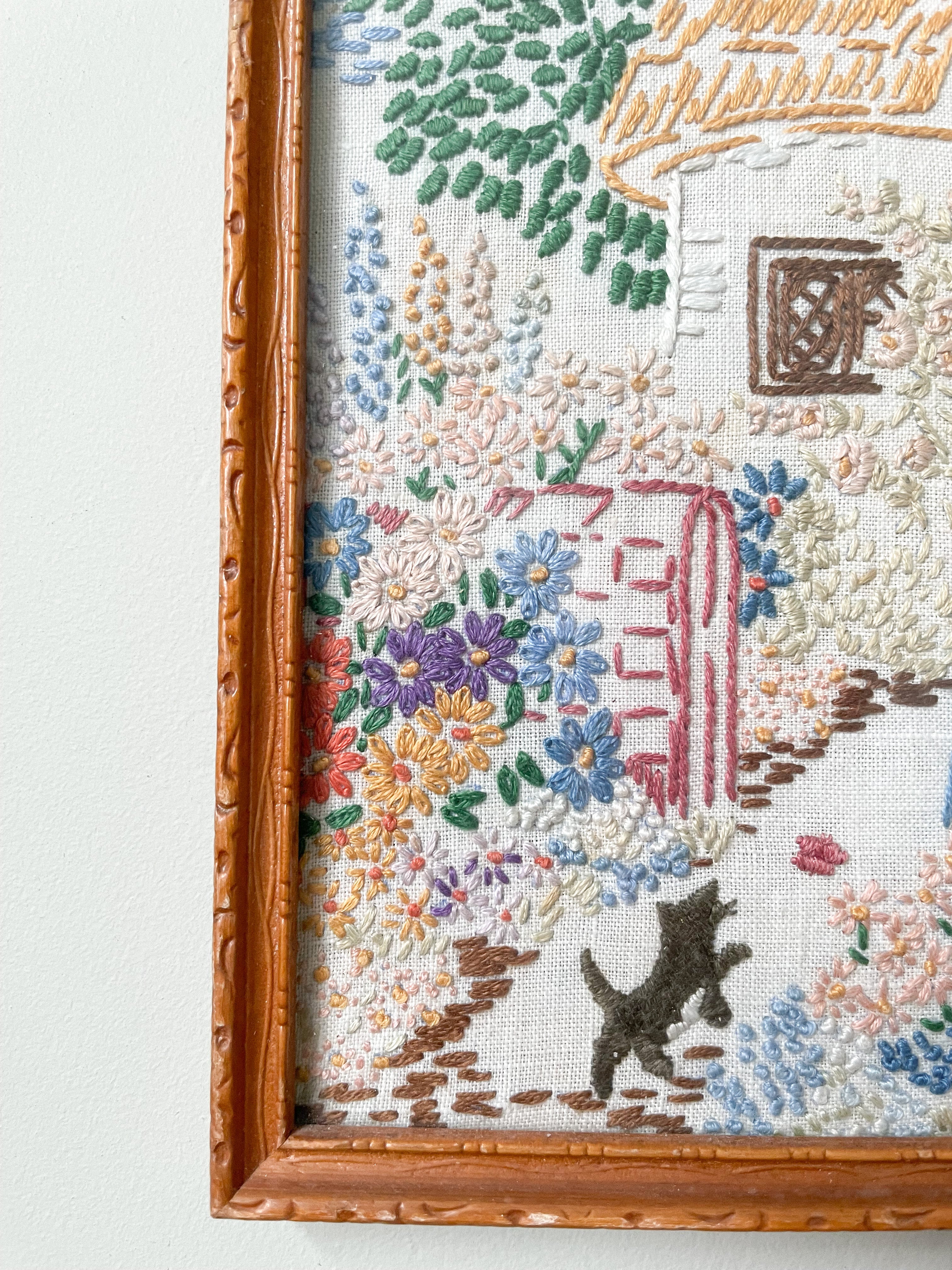 Pair of vintage framed embroideries in pastels, sailing boat and thatched cottage with cat - Moppet