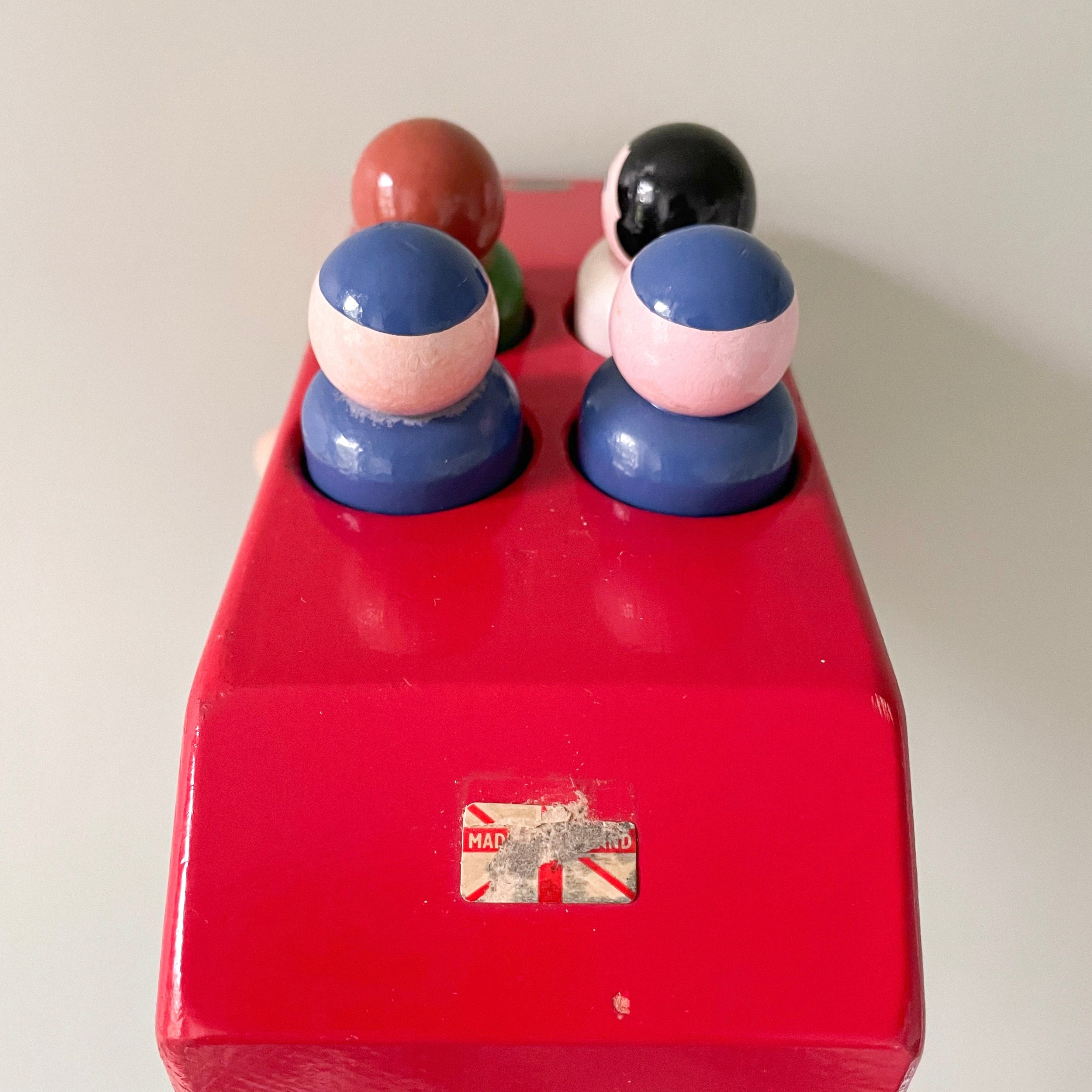 Vintage 1950s red wooden Escor car with four peg-doll passengers, British made - Moppet