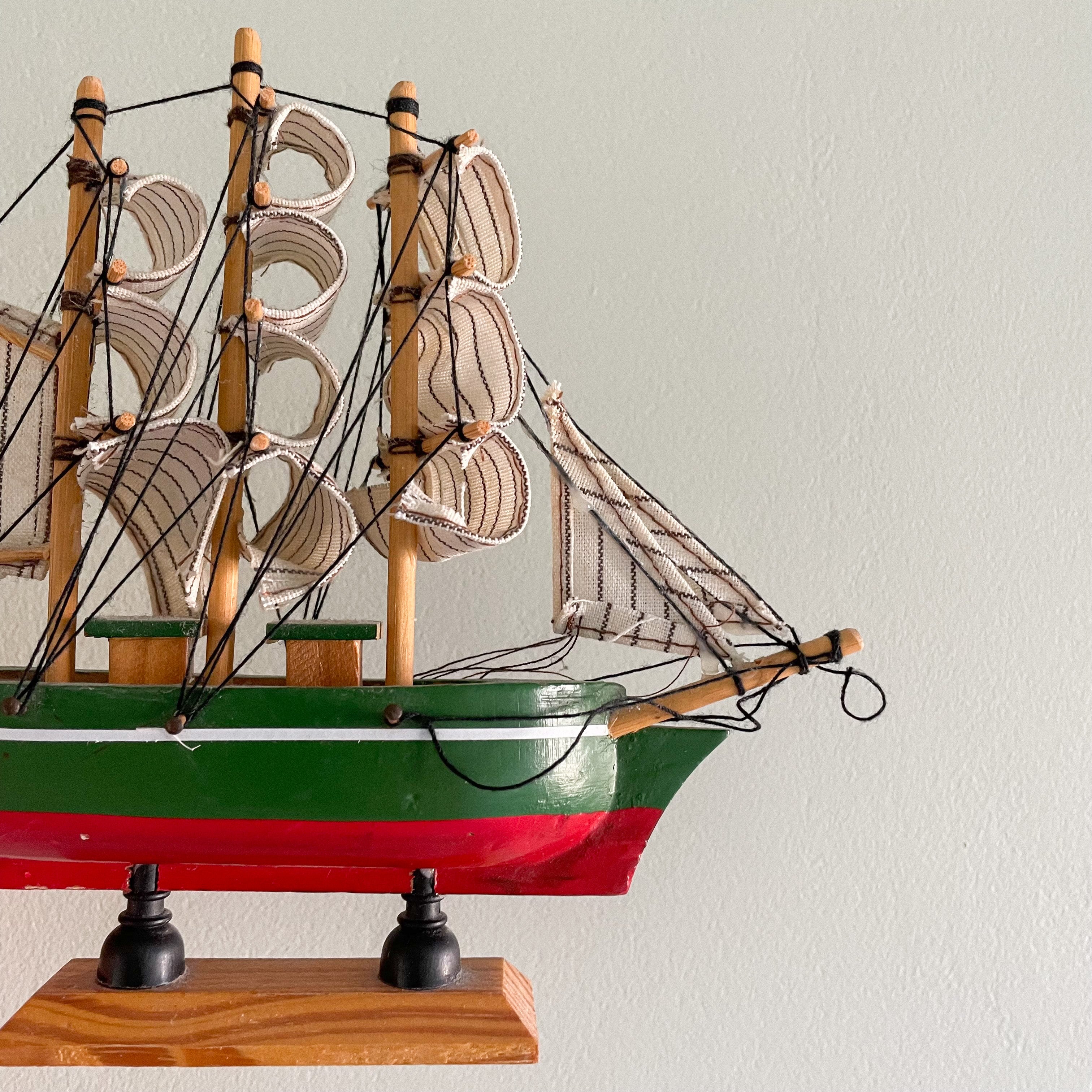 Vintage wooden model sailing ship in green and red - Moppet