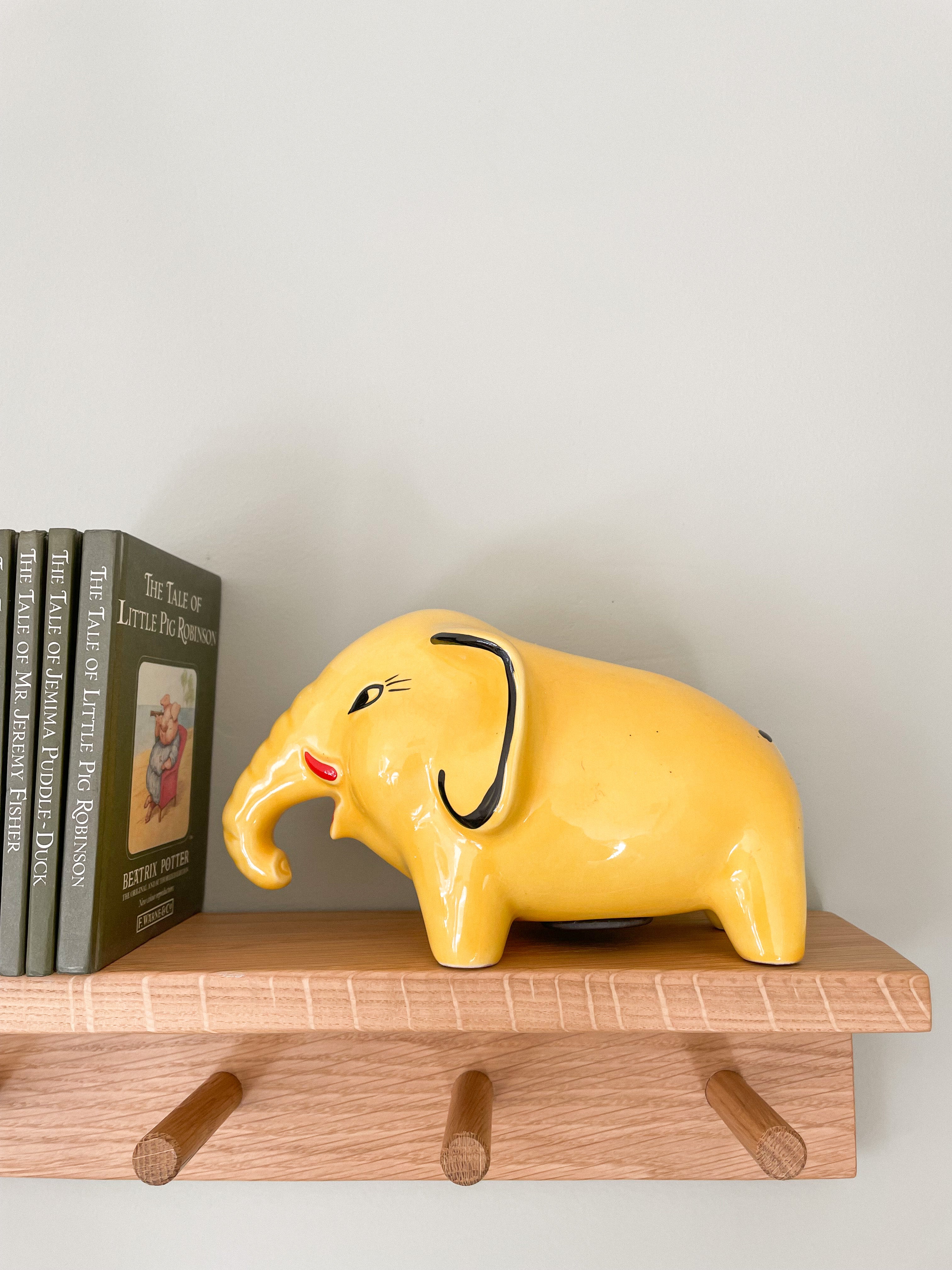 Vintage ceramic elephant piggy bank or money box in yellow, by Arthur Wood, made in Britain - Moppet