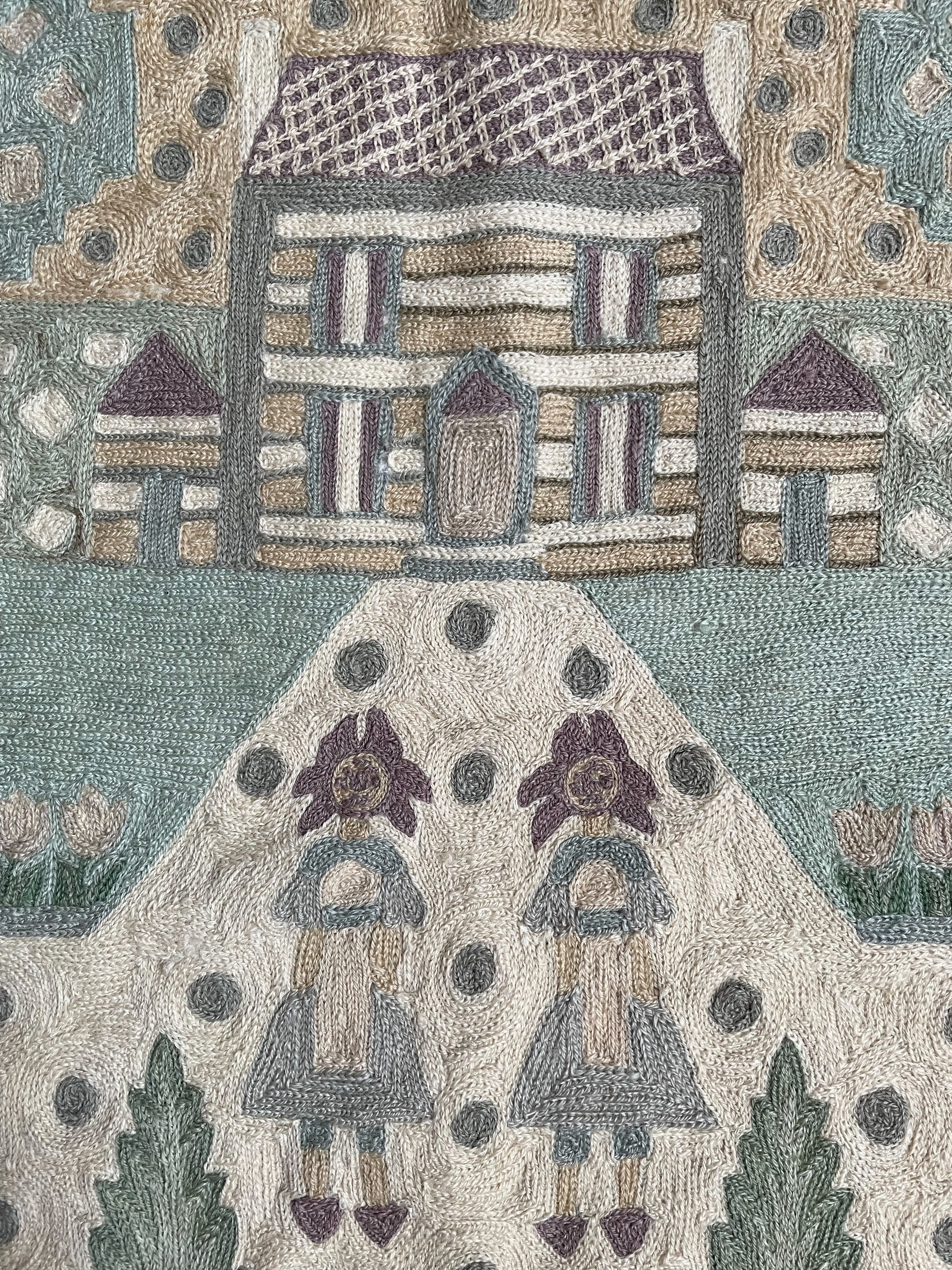 Vintage hand-embroidered crewel wall hanging of two people, a house and a garden - Moppet