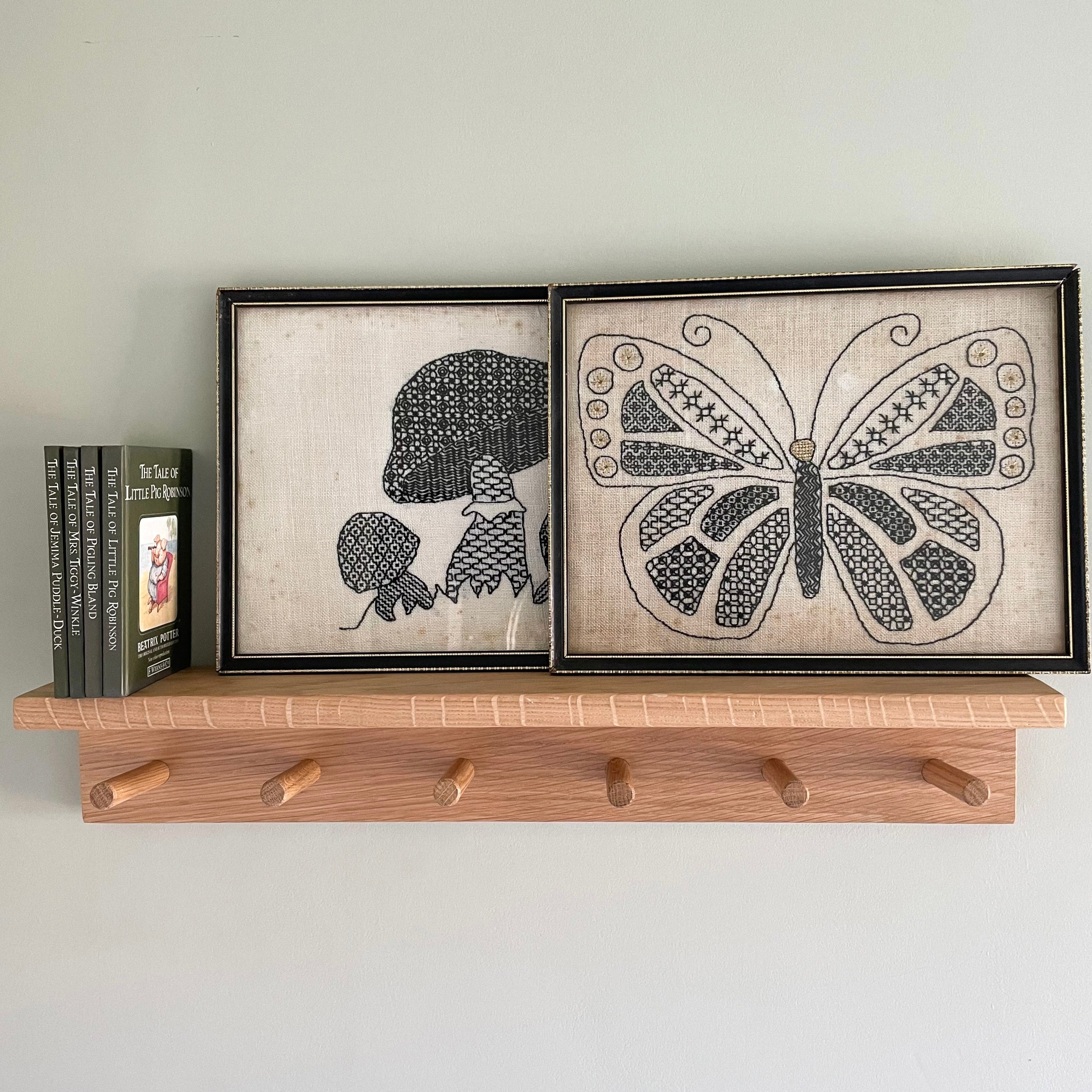 Pair of vintage Swedish framed monochrome embroideries in black and white, toadstools/mushrooms and butterfly - Moppet