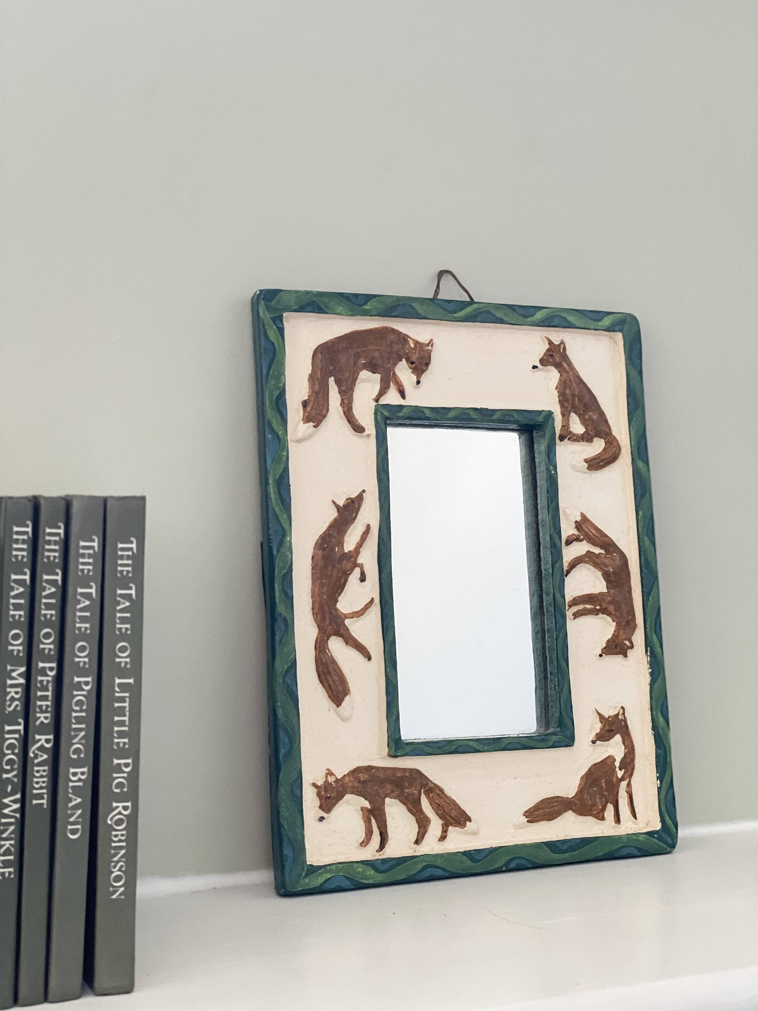 Vintage handmade ceramic mirror featuring foxes in blue green and brown - Moppet