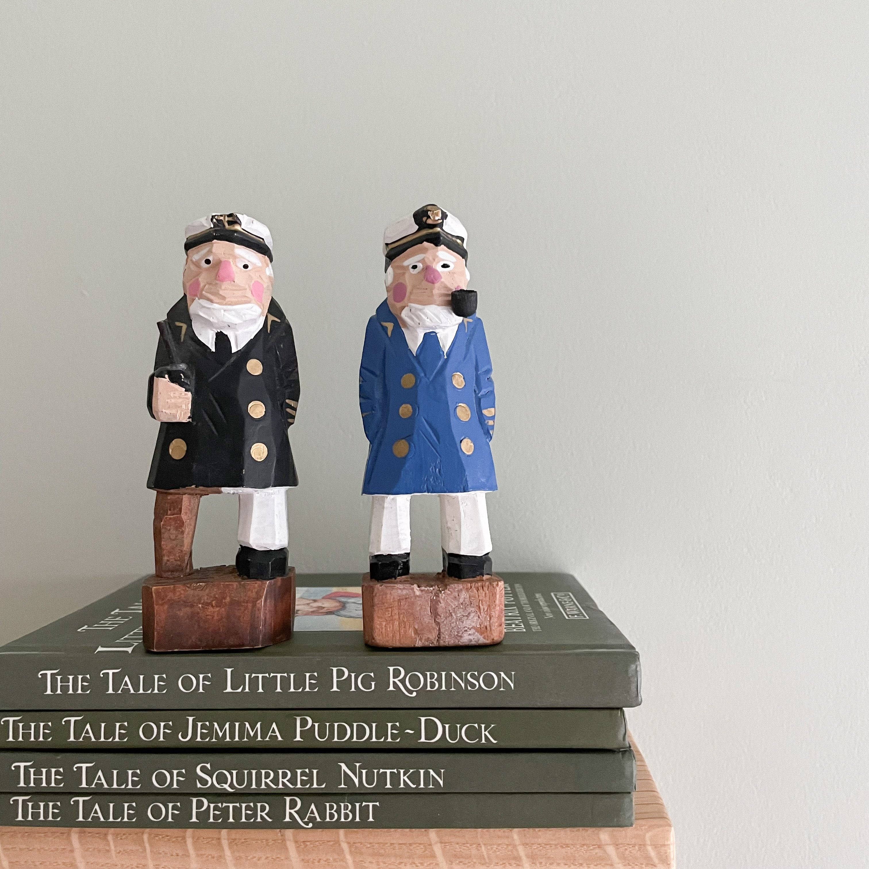 Pair of vintage hand-painted and carved folk art wooden ship’s captains - Moppet