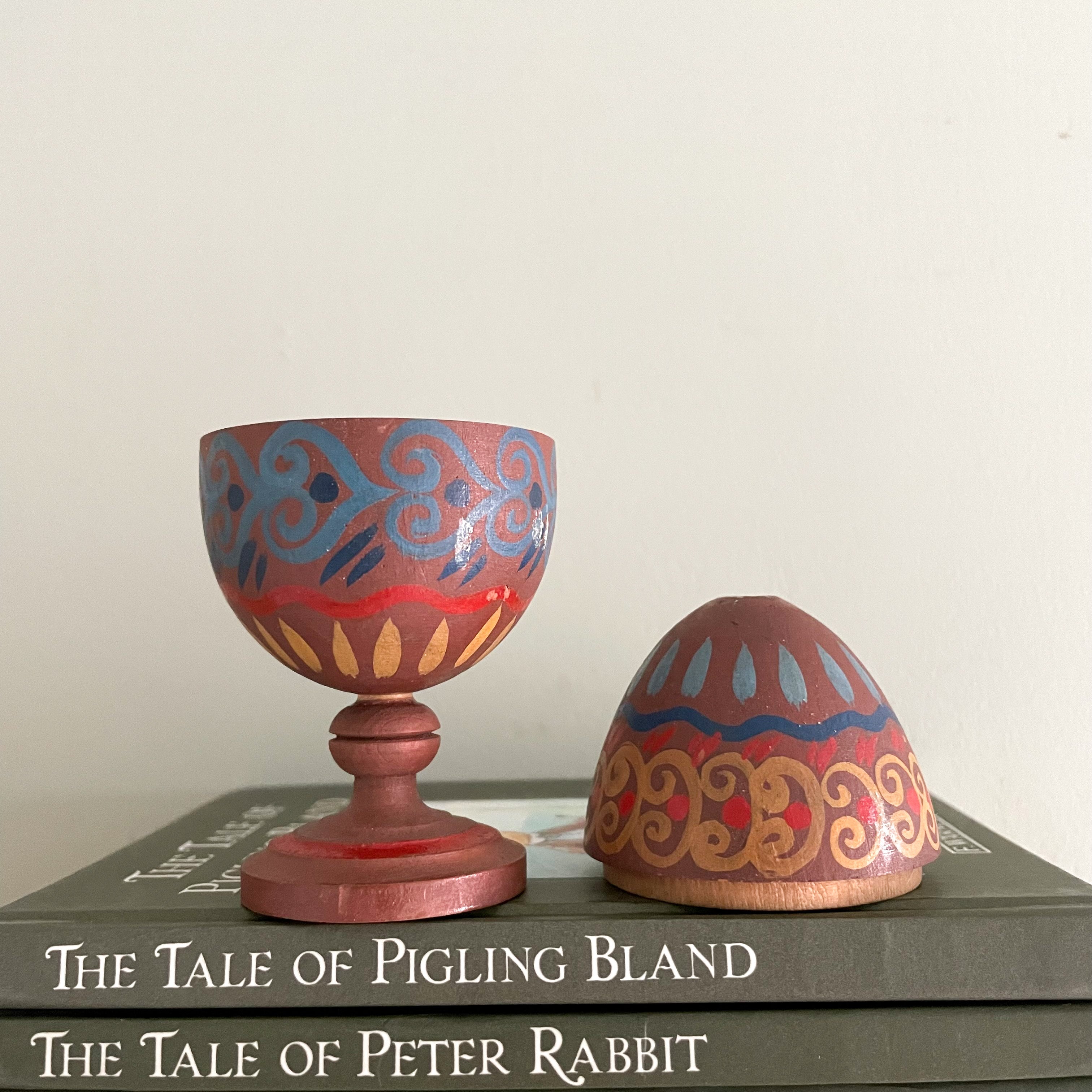Vintage hand-painted folk art wooden egg decoration on pedastal - Moppet