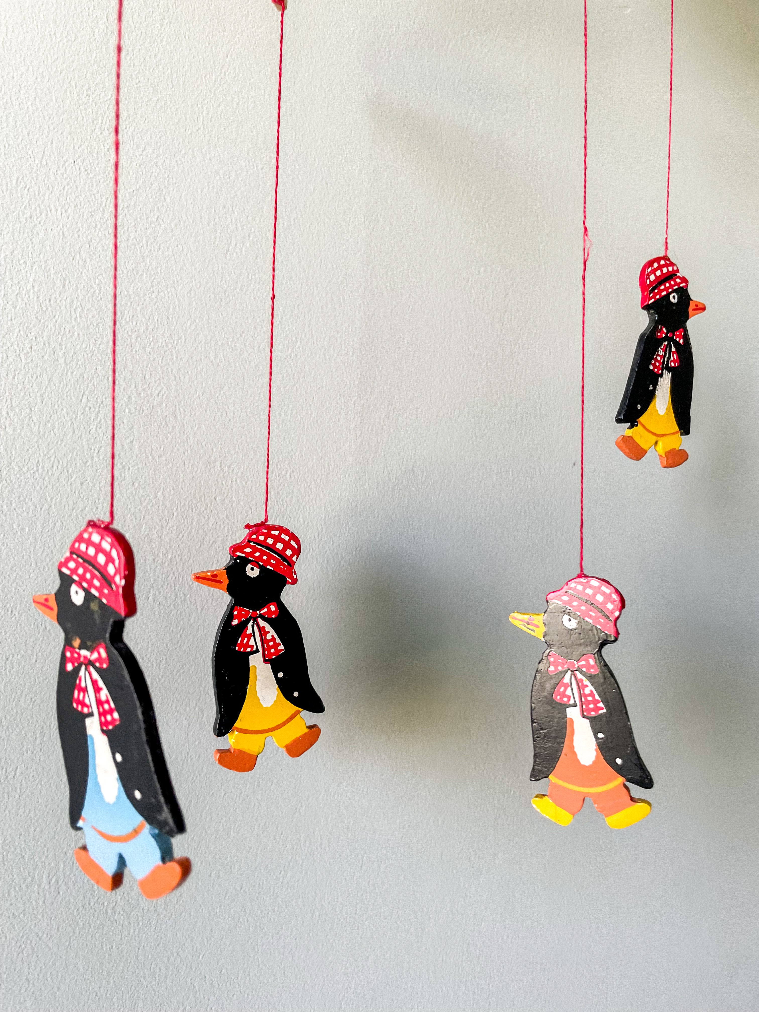 Vintage wooden mobile featuring penguins - Moppet