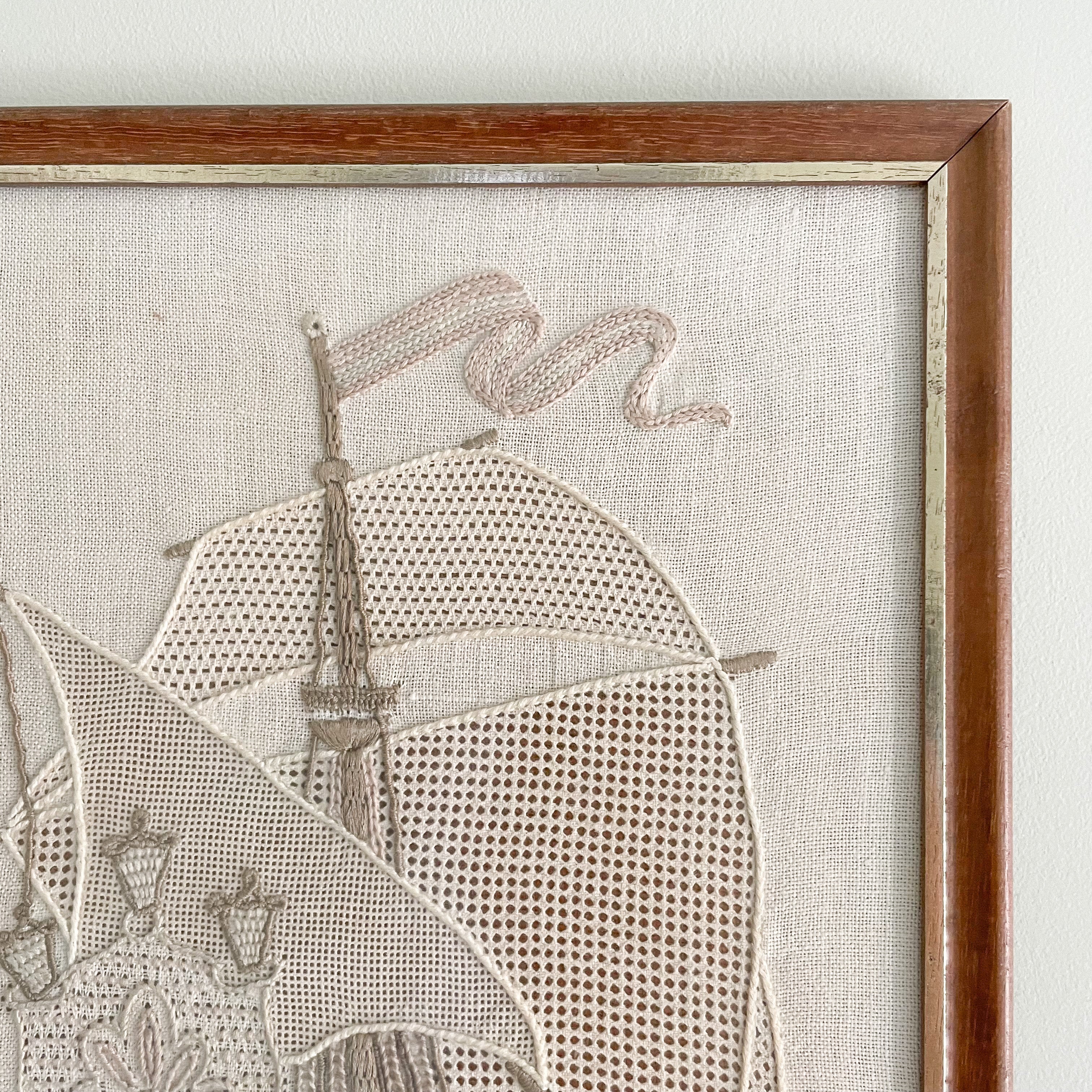 Vintage framed embroidery of a ship with neutral colour palette - Moppet
