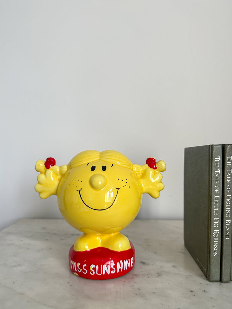 Vintage Little Miss Sunshine yellow ceramic piggy bank money box from Moppet