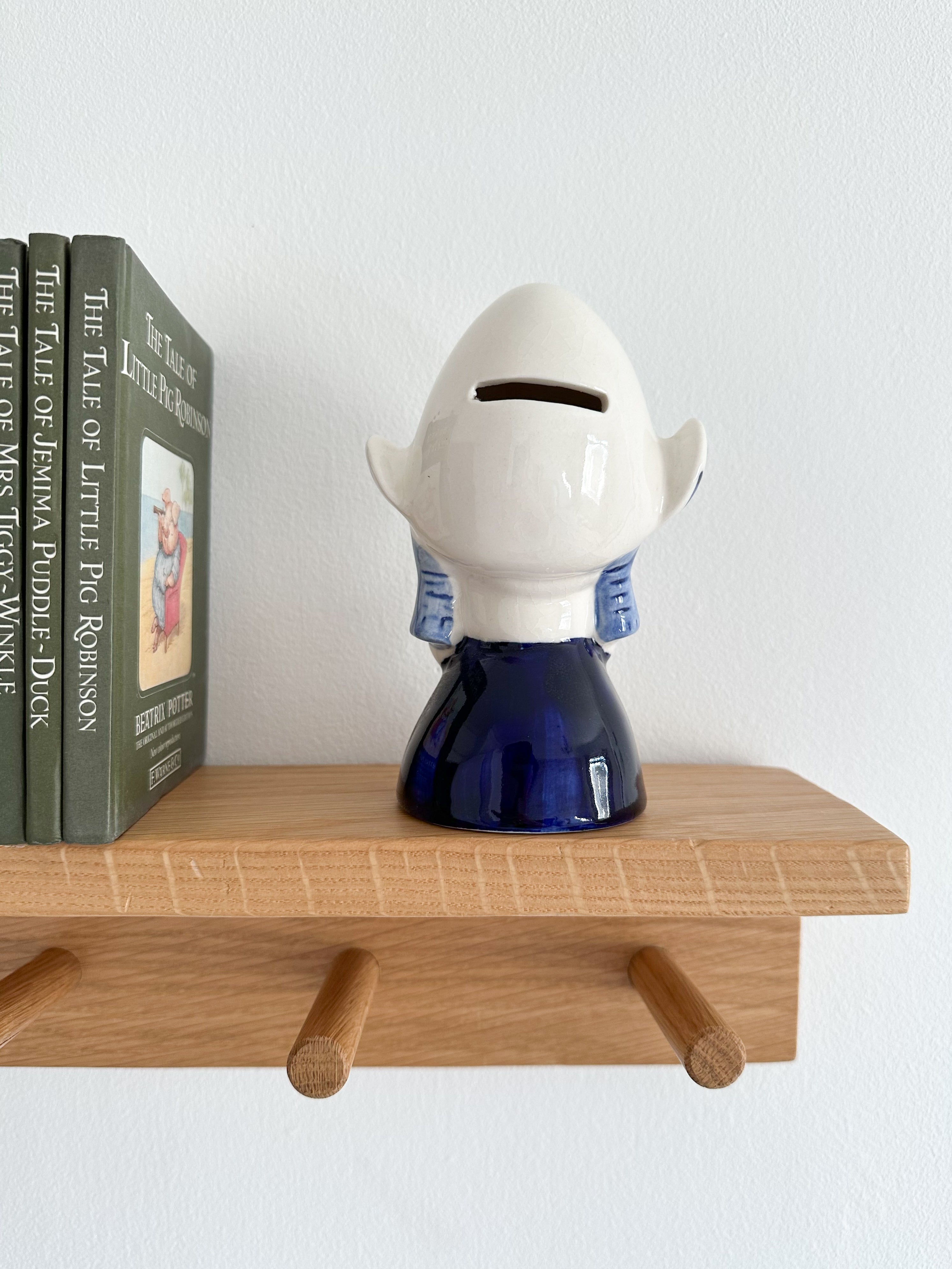 Vintage ceramic Delft Dutch girl piggy bank or money box, blue and white - Moppet