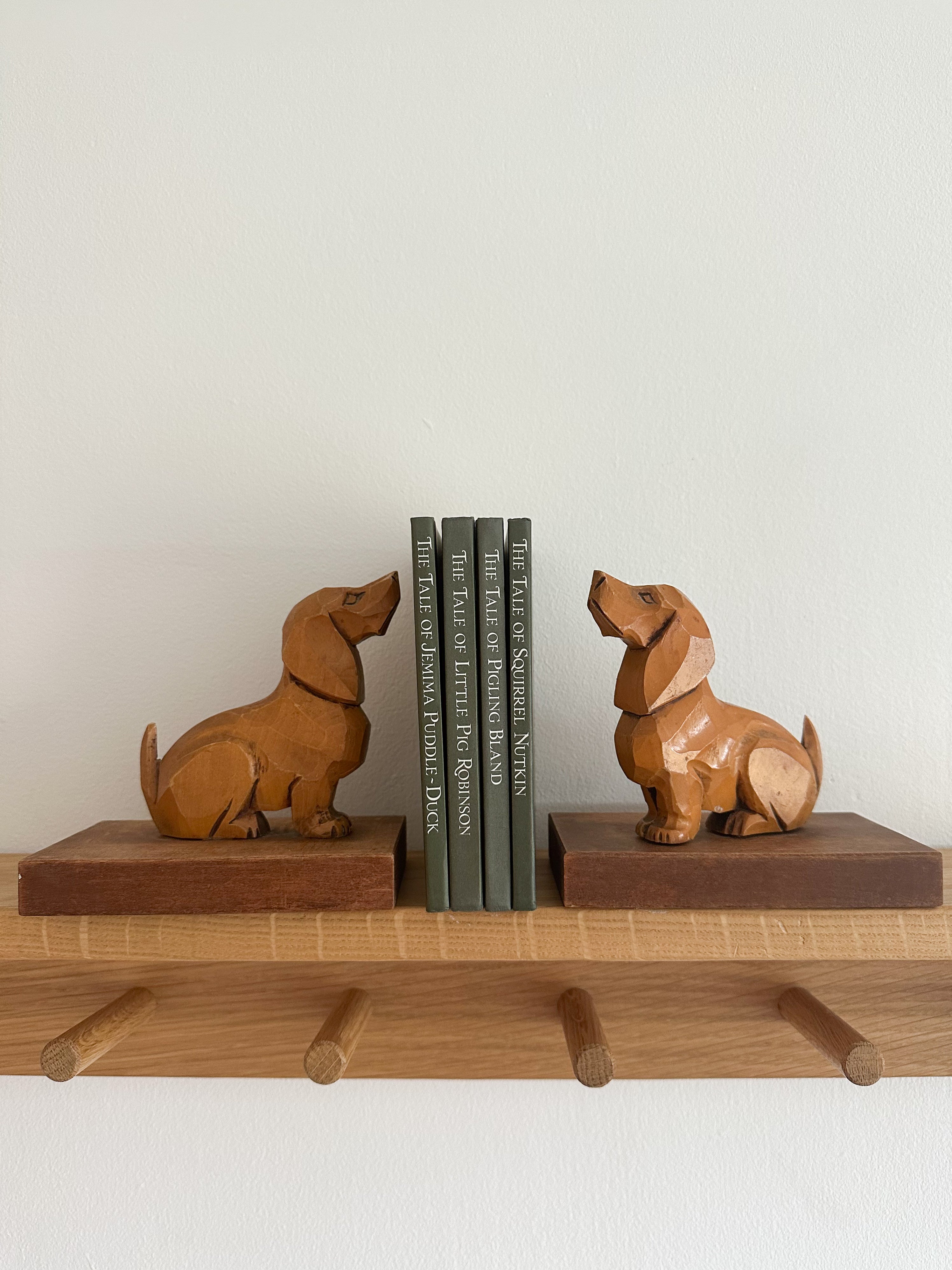 Pair of rare vintage hand-carved wooden Art Deco dachshund sausage dog bookends, red and blue - Moppet