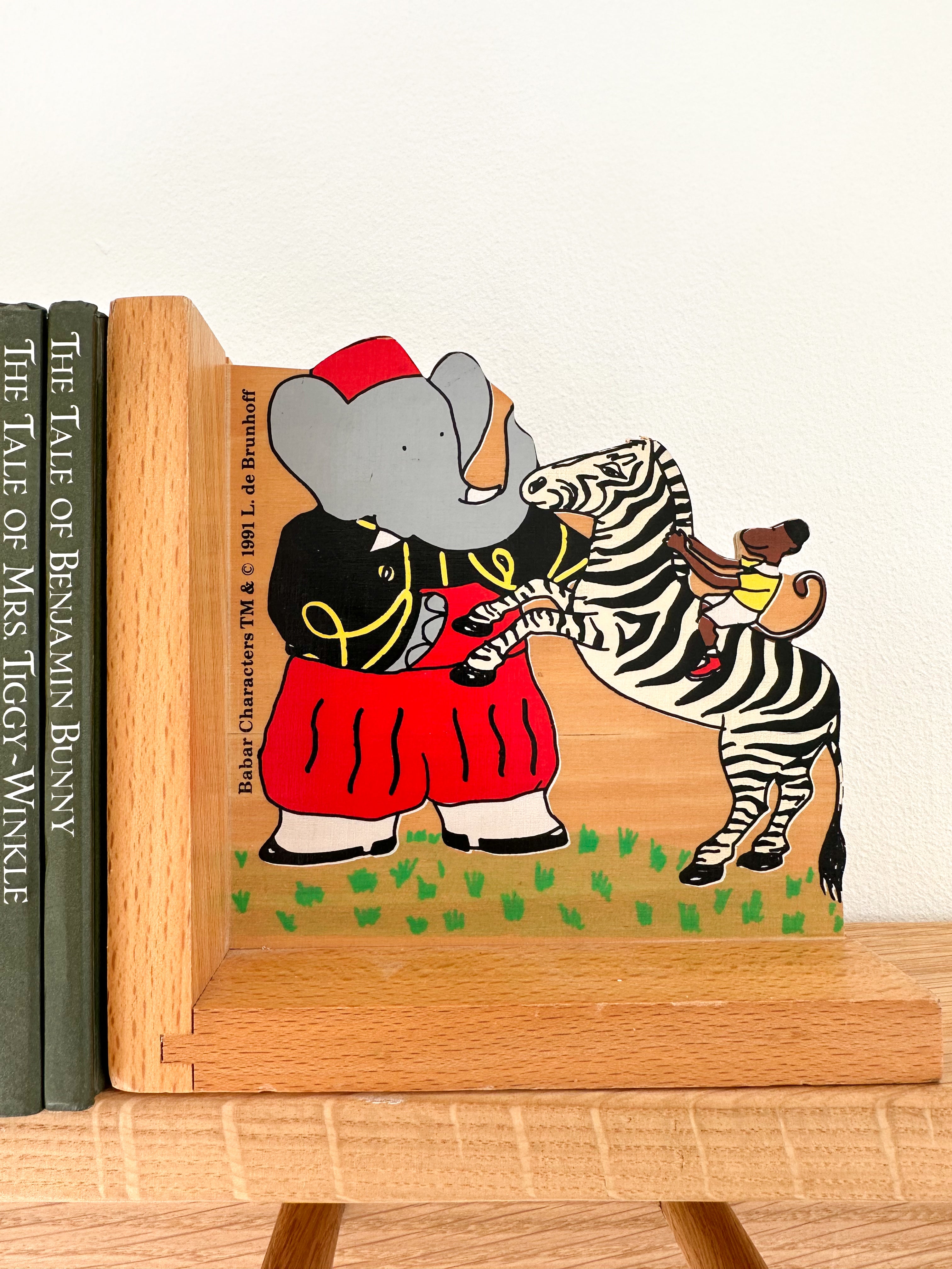 Pair of vintage 1991 wooden Babar bookends with zebra - Moppet