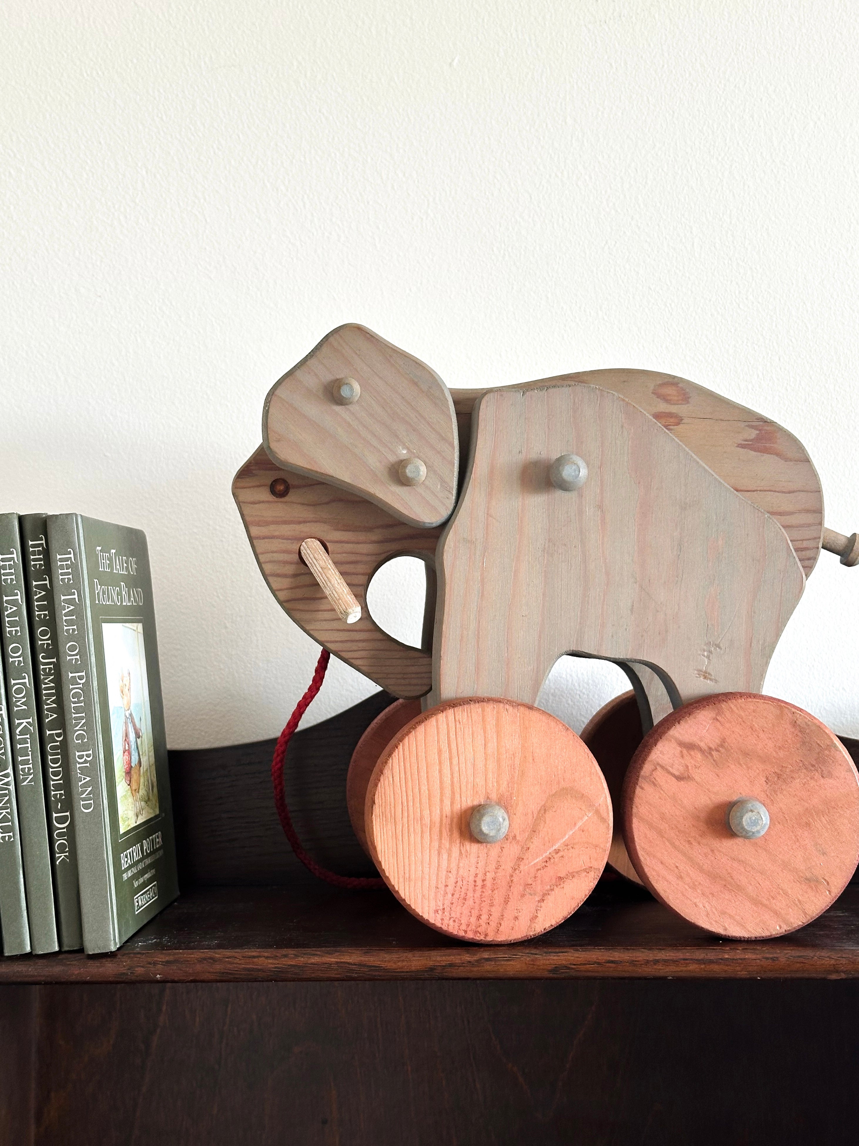Vintage 1970s wooden handmade pull-along elephant
