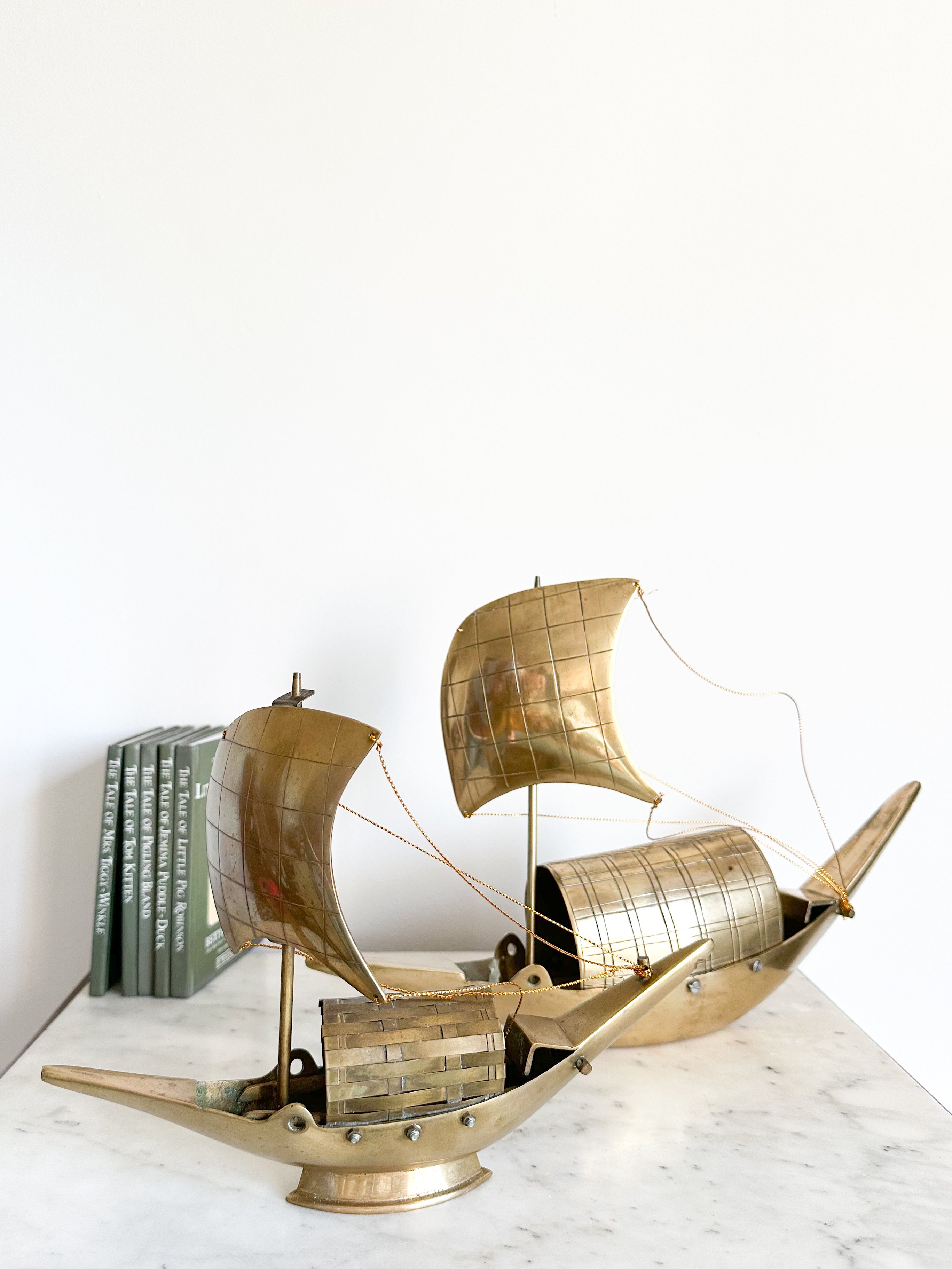 Vintage brass sailing boat
