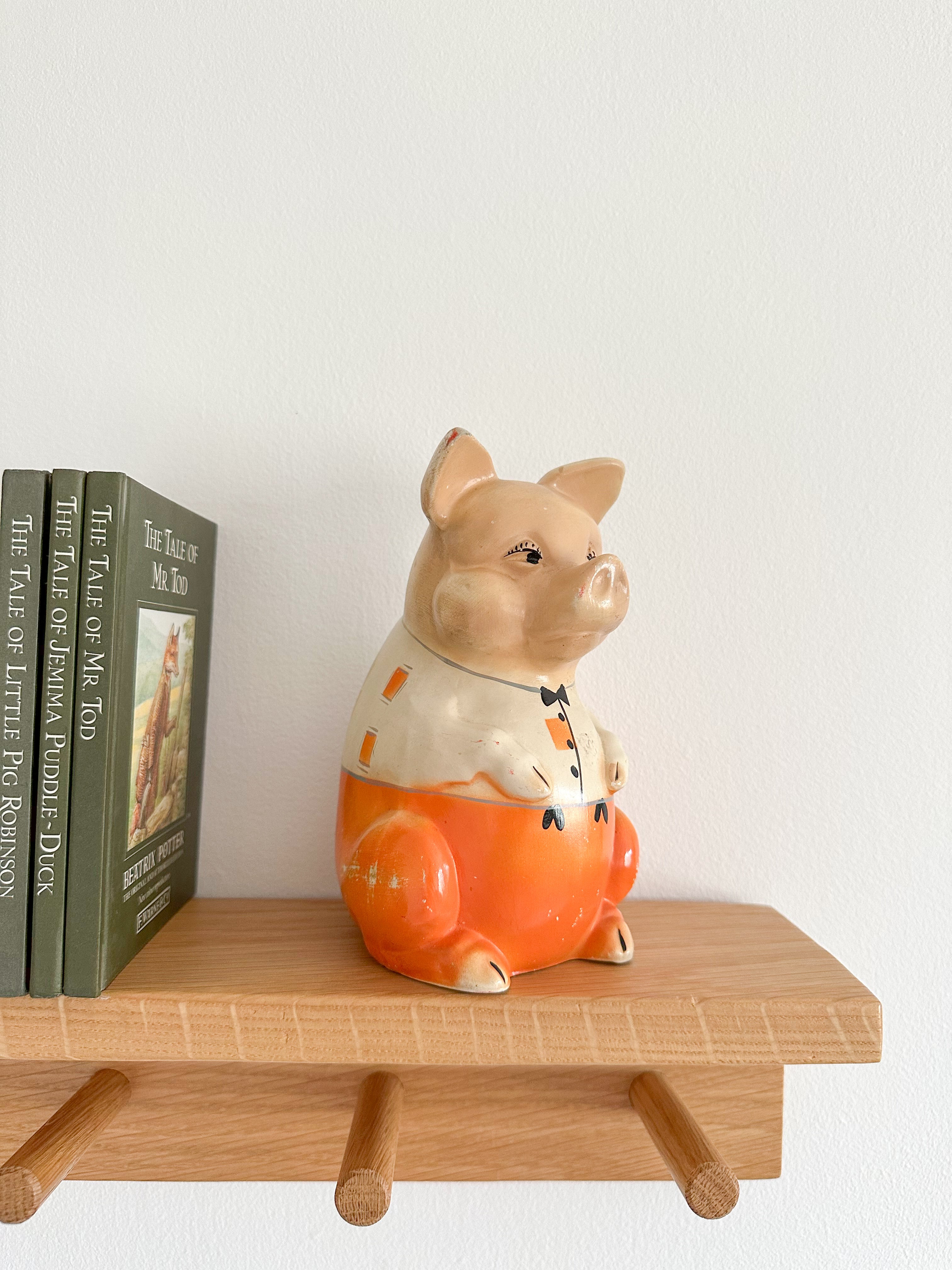 Vintage 1920s ceramic collectable ‘Mr Pig’ piggy bank or money box, by Ellgreave, small with orange trousers - Moppet