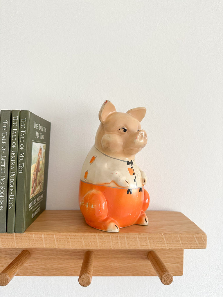 Vintage 1920s ceramic collectable ‘Mr Pig’ piggy bank or money box, by Ellgreave, small with orange trousers - Moppet