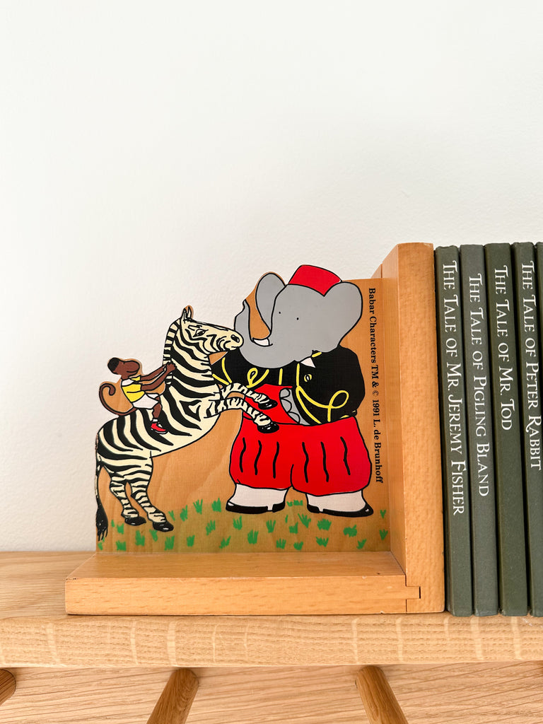 Pair of vintage 1991 wooden Babar bookends with zebra - Moppet