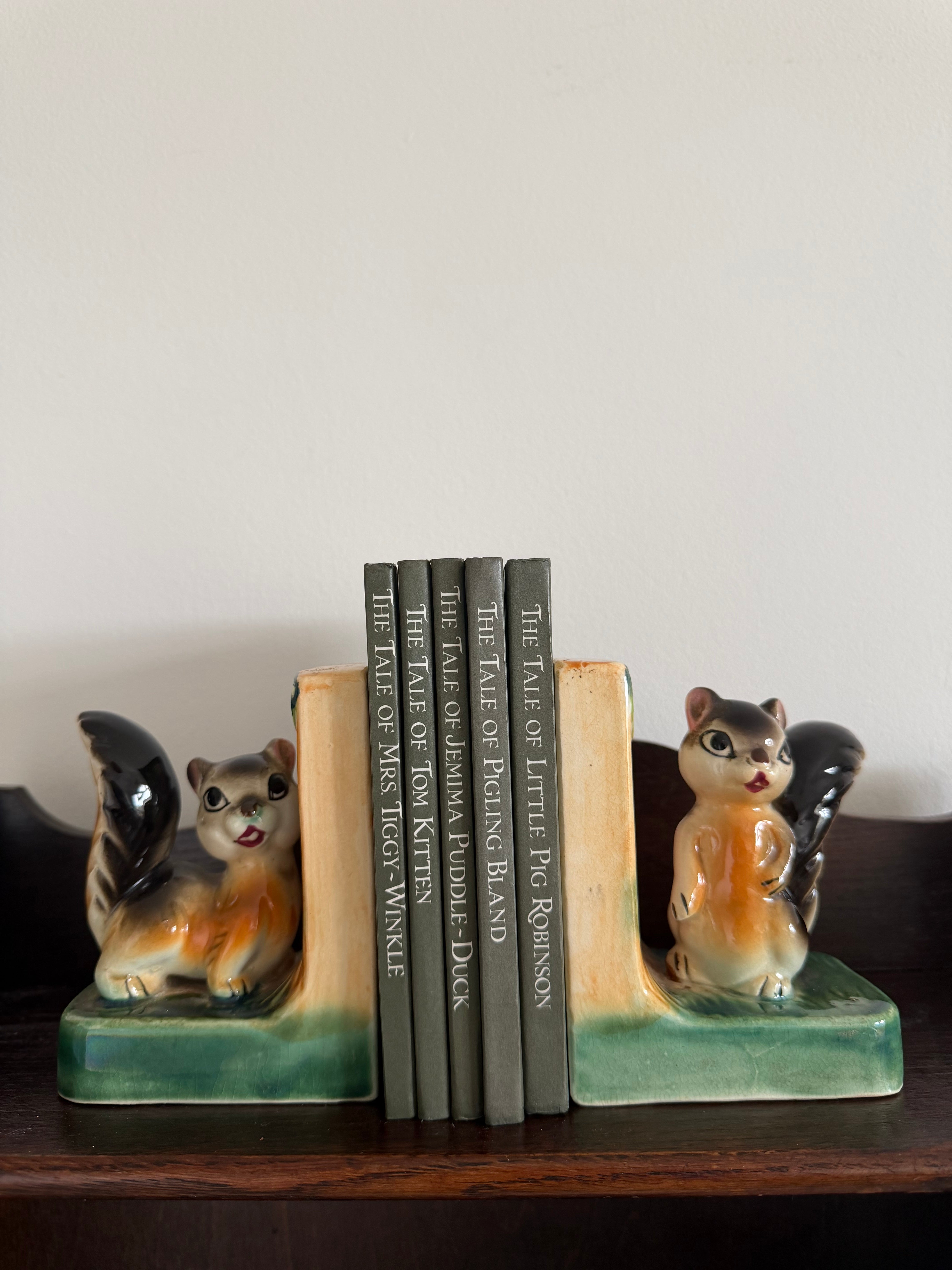 Pair of rare vintage 1960s ceramic squirrel bookends in pink
