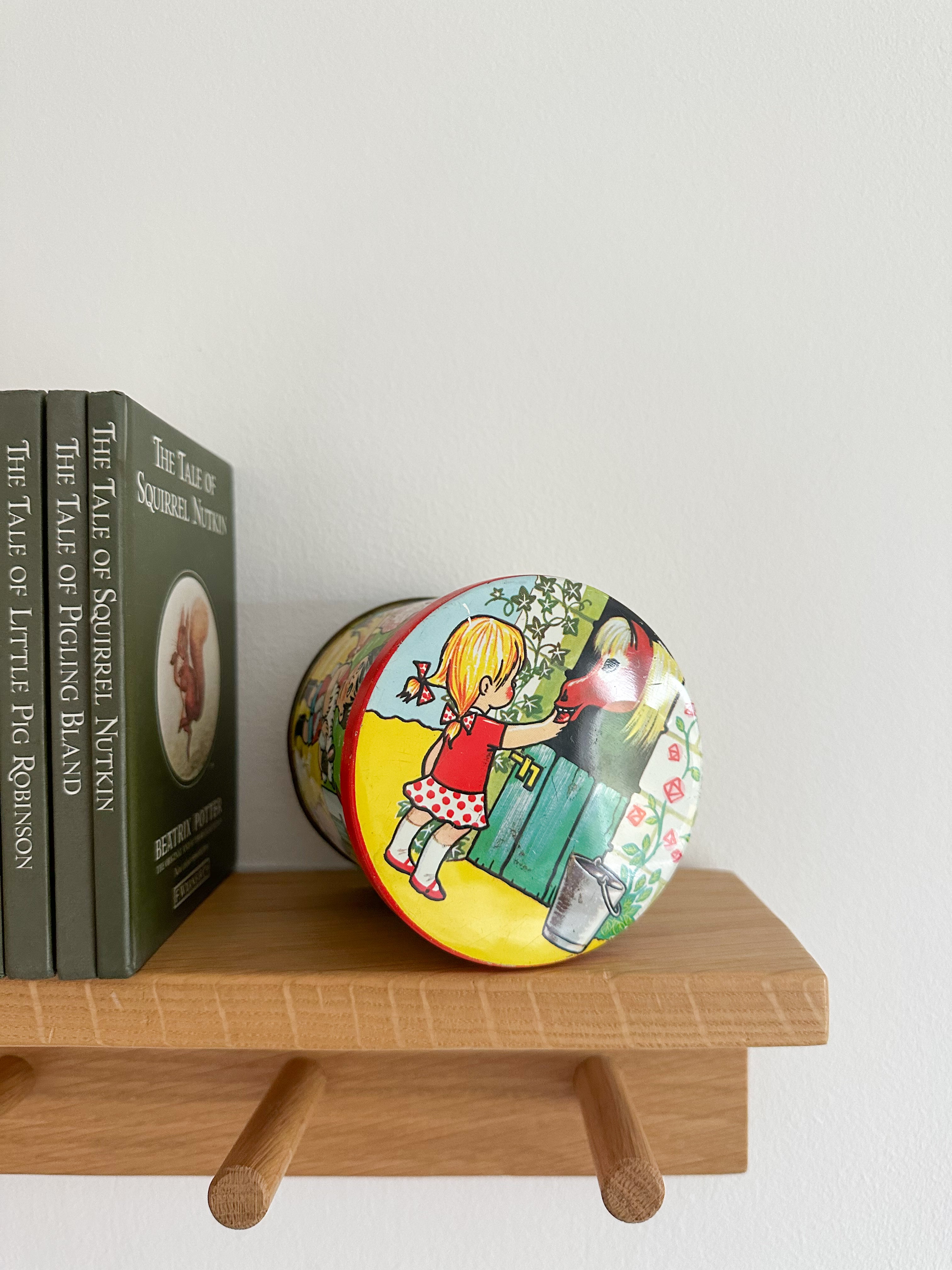 Vintage 1950s children’s illustrated graphic tin feat. girls and boys with farm animals, by Bluebird Toffee - Moppet