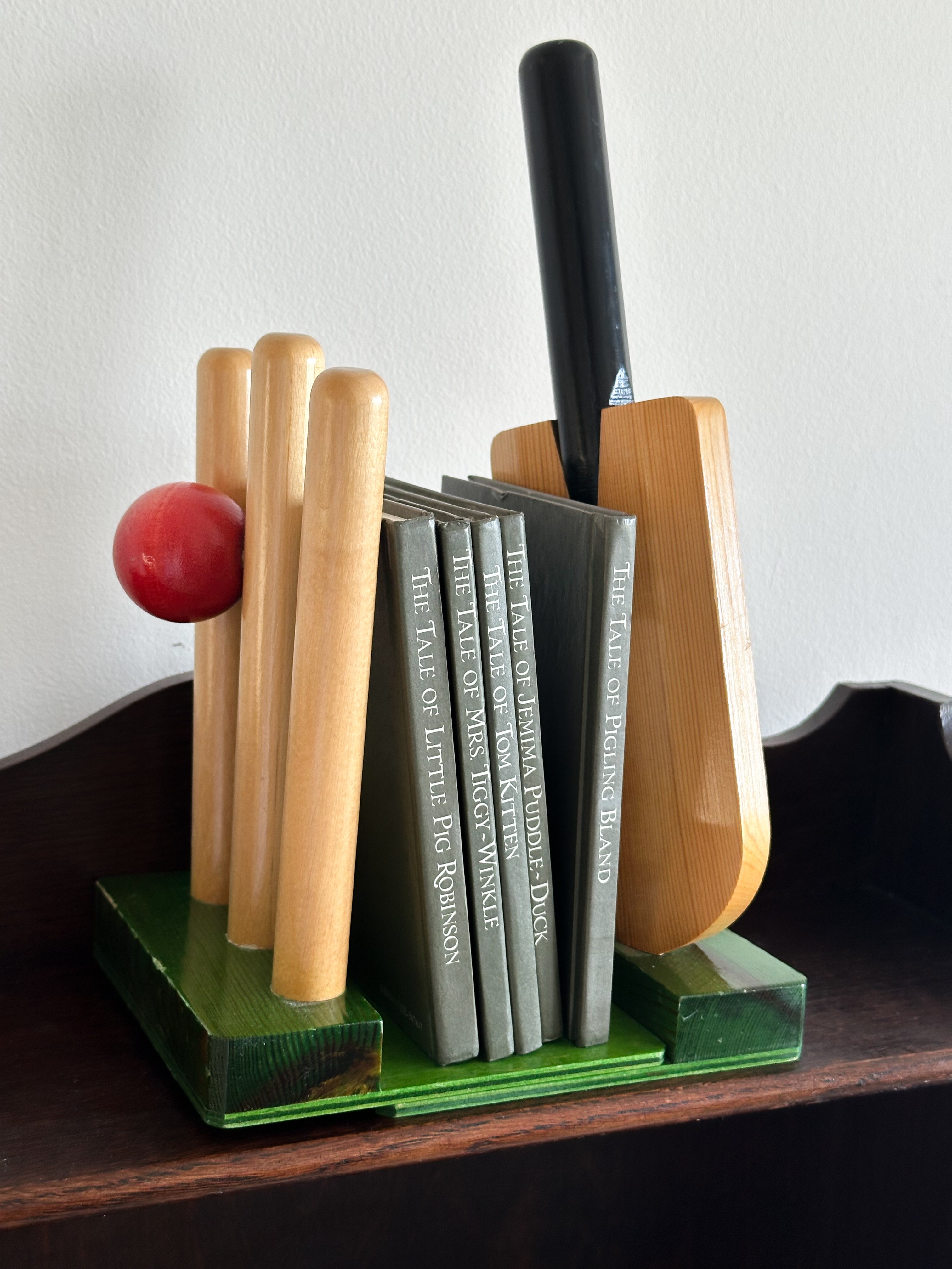 Pair of vintage handmade wooden cricket bat/wicket bookends