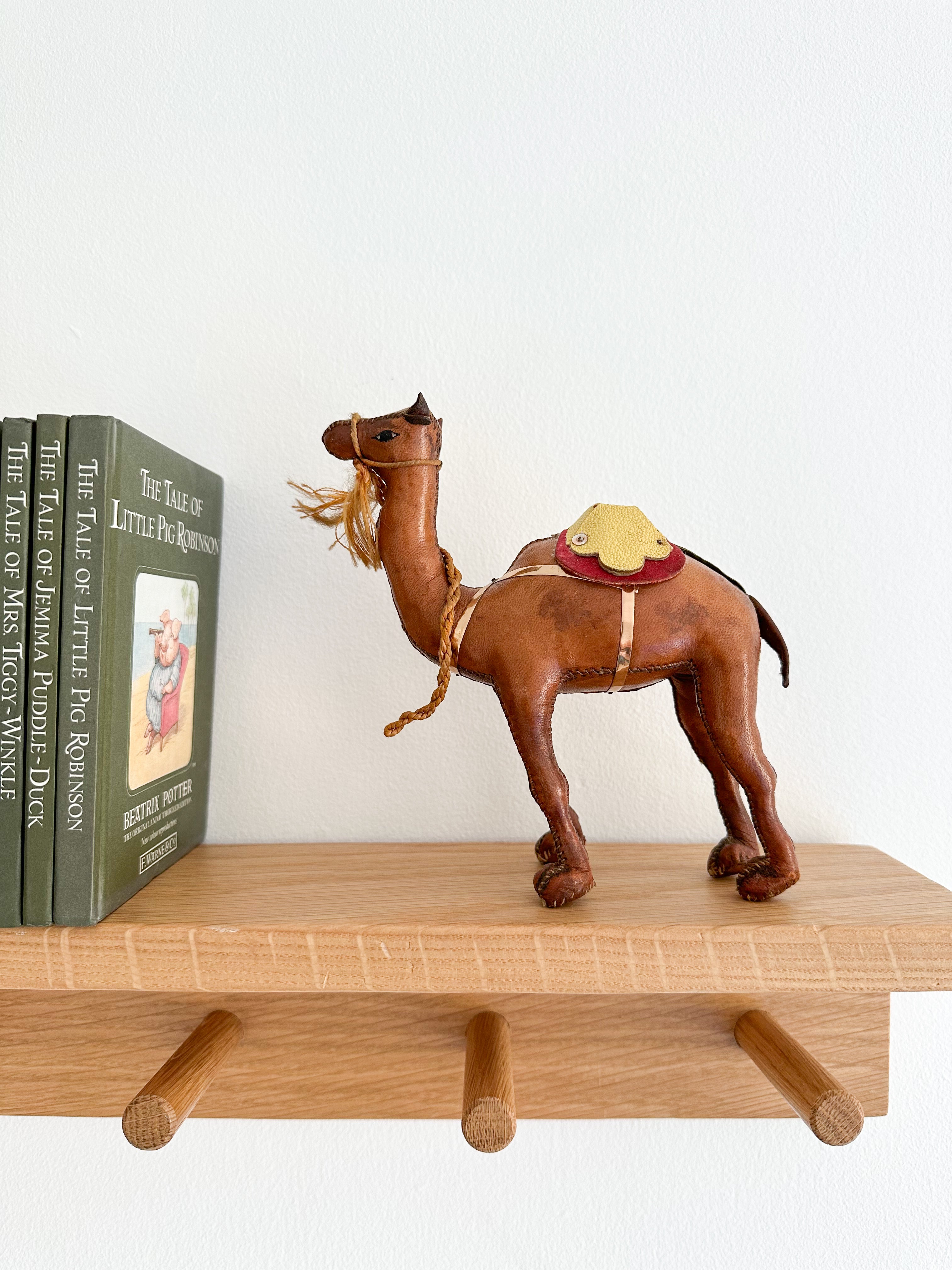 Vintage handmade leather-wrapped wooden camel figurine - Moppet