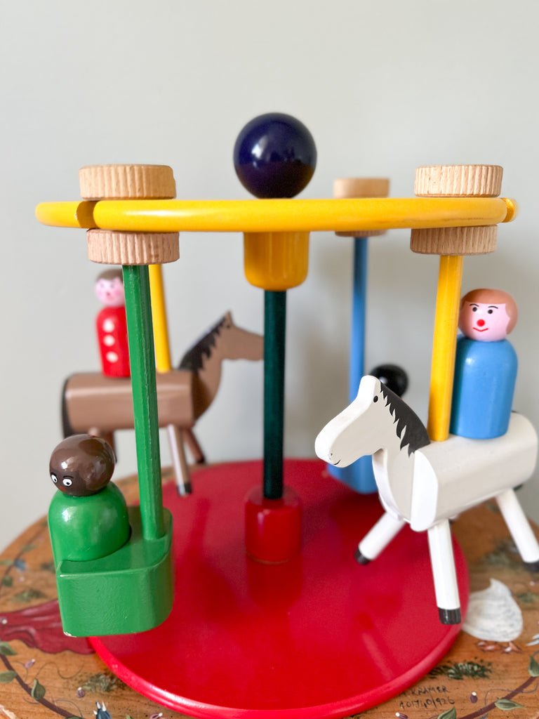 Vintage 1950s wooden Escor carousel or merry-go-round with four peg-doll passengers, British made - Moppet