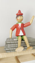 Load and play video in Gallery viewer, Vintage Italian wooden articulated wooden Pinocchio, by Sevi 1831
