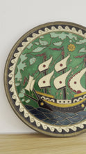 Load and play video in Gallery viewer, Vintage Greek brass enamelled plate featuring a ship
