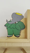 Load and play video in Gallery viewer, Pair of vintage wooden Babar and Celeste bookends
