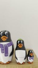 Load and play video in Gallery viewer, Vintage wooden nesting penguin ‘Russian’ dolls
