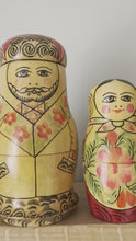 Load and play video in Gallery viewer, Vintage unusual wooden family nesting Russian Matryoshka dolls
