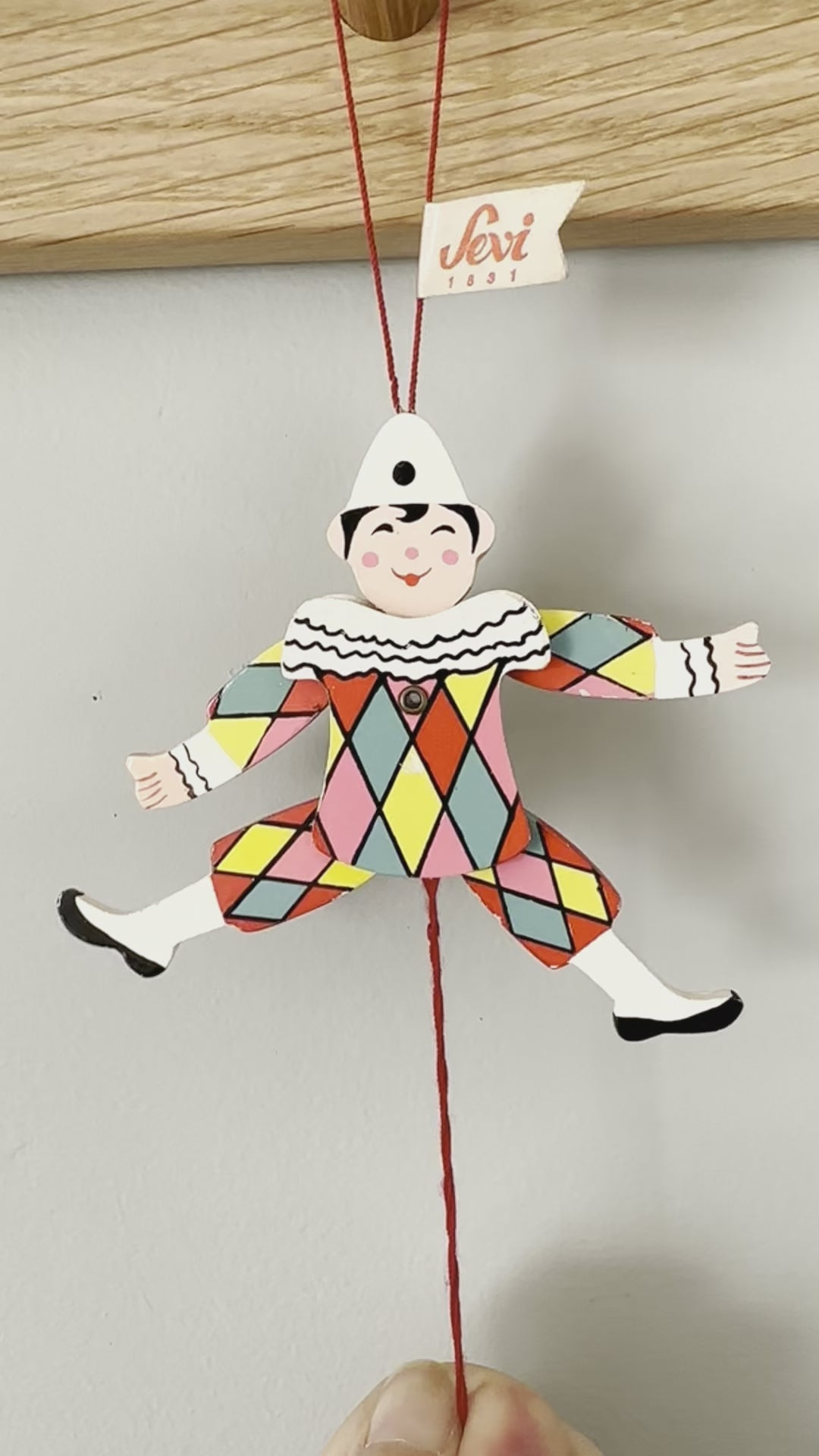 Vintage Italian wooden harlequin clown jumping-jack pull toy, by Sevi 1831