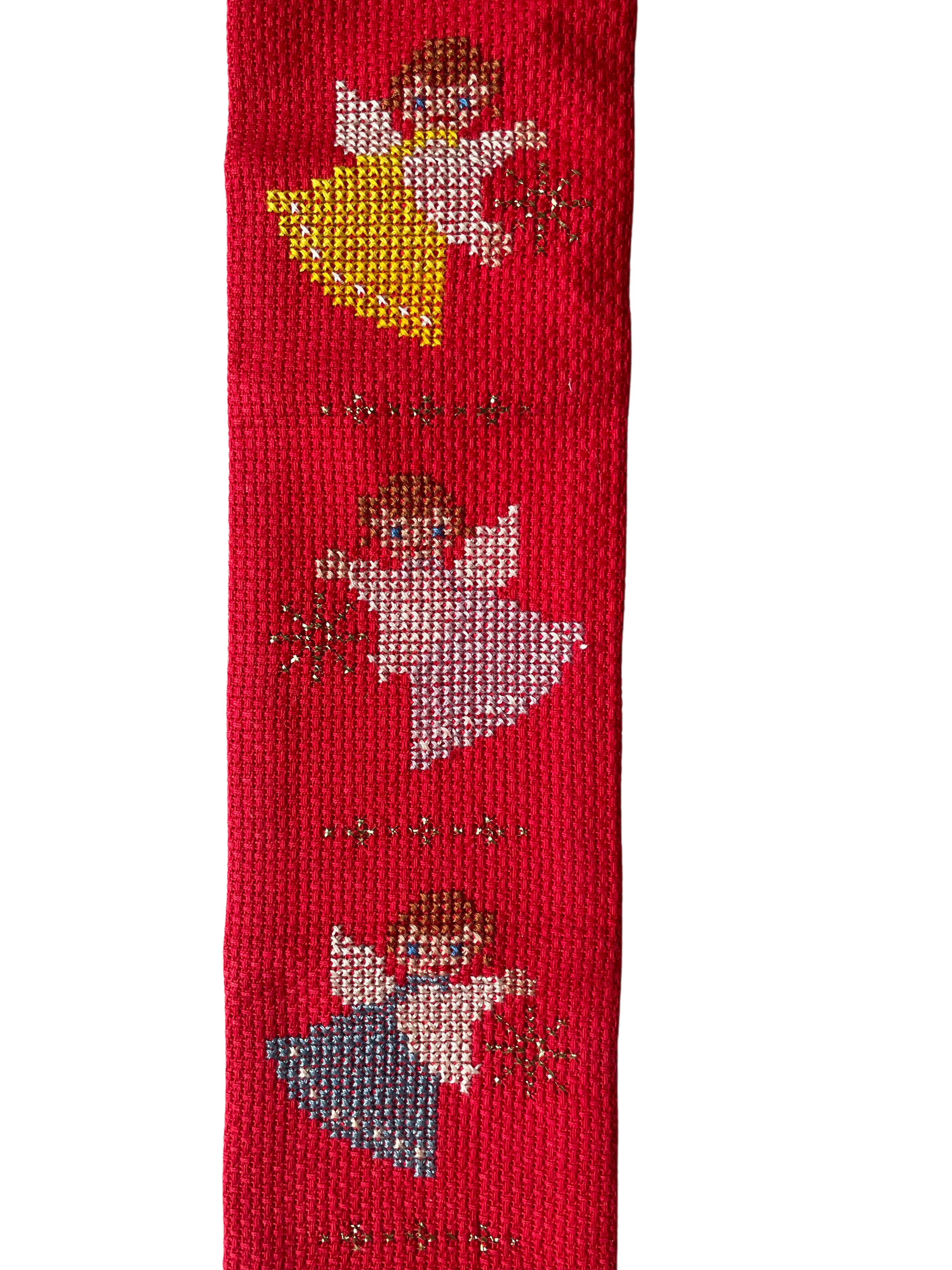 Vintage 1960s Danish handmade embroidered Christmas wall hanging featuring three angles in green, yellow, pink and blue on a red background. - Moppet